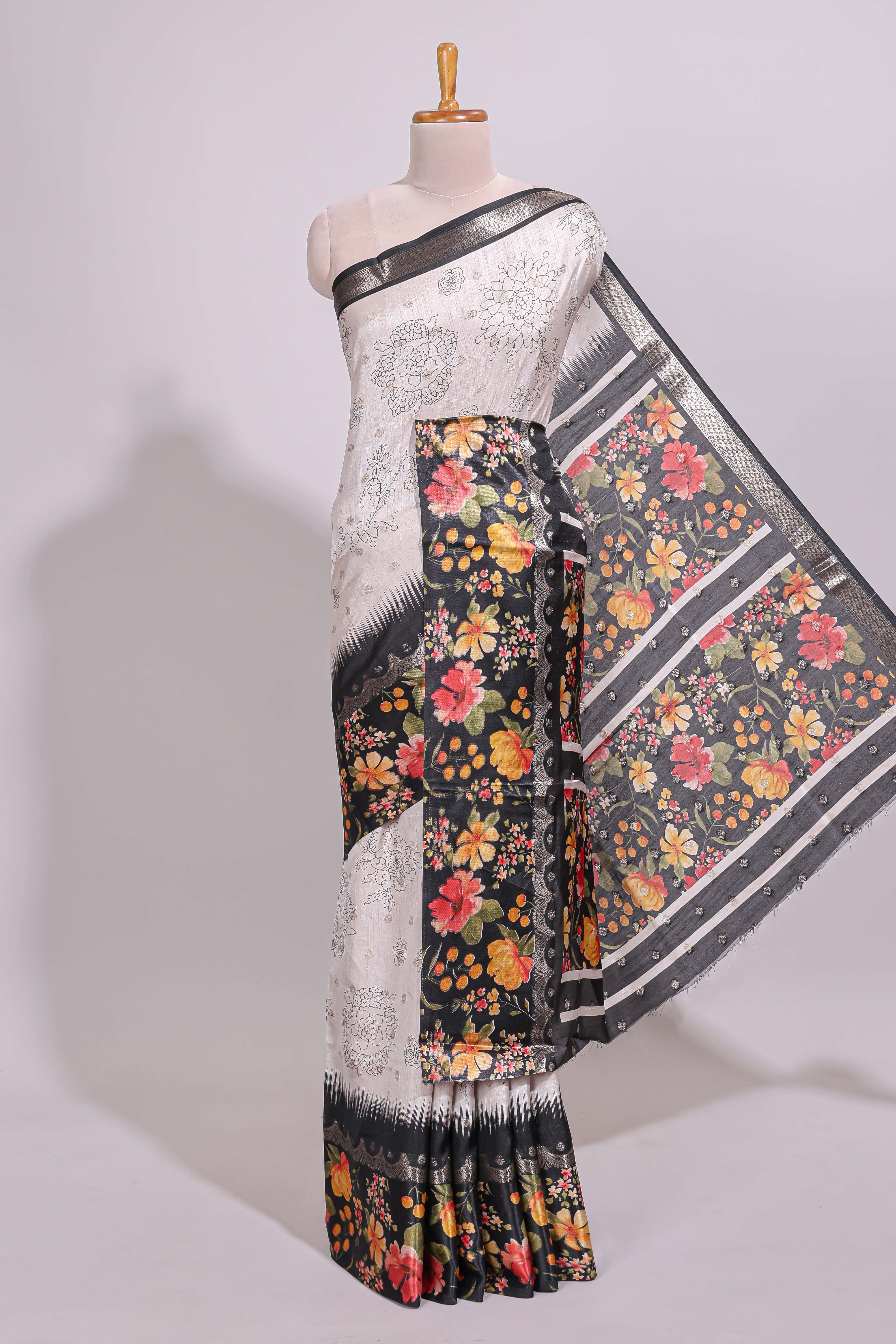 Off white floral design dola silk saree with contrast black border and printed motifs blouse