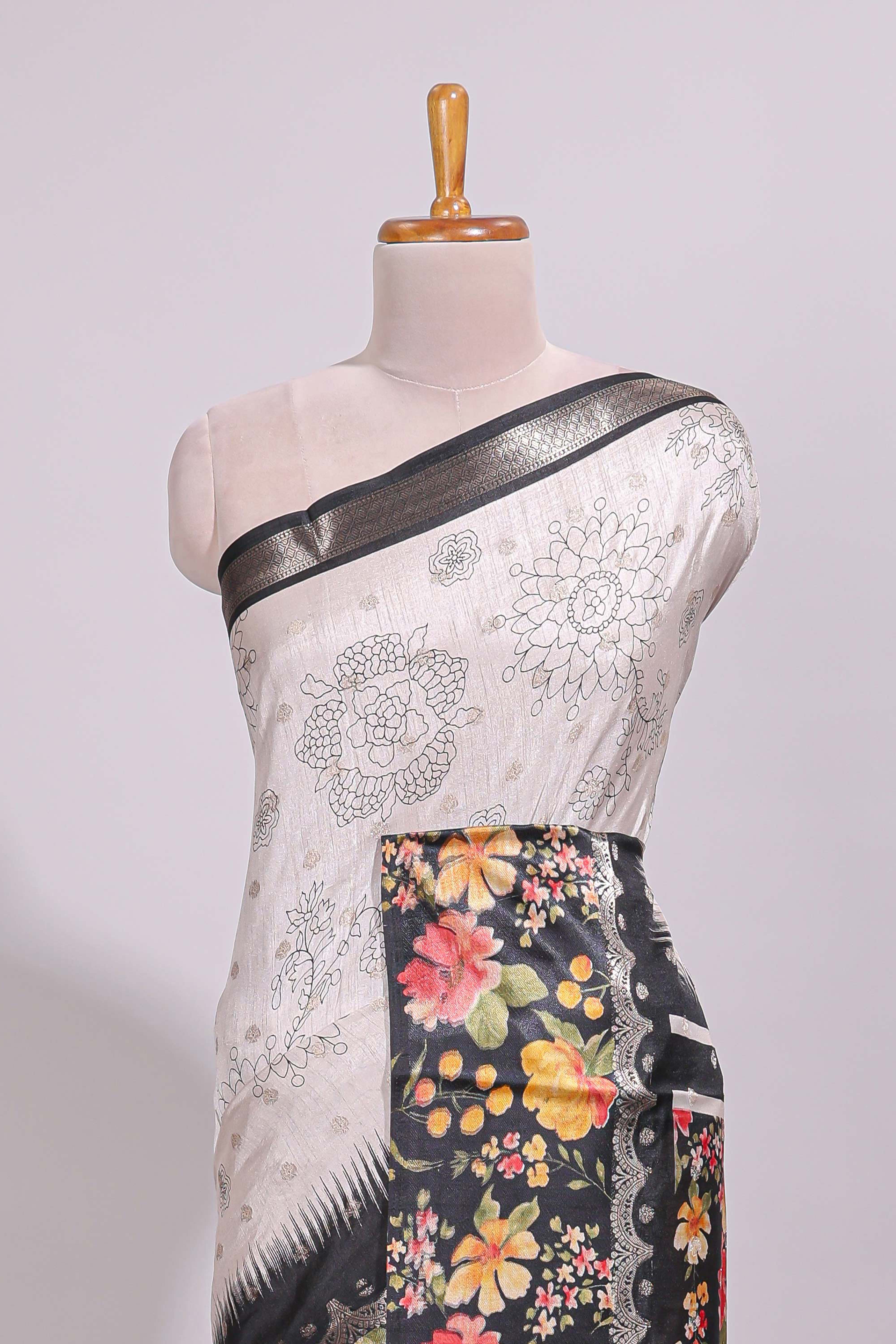 Off white floral design dola silk saree with contrast black border and printed motifs blouse