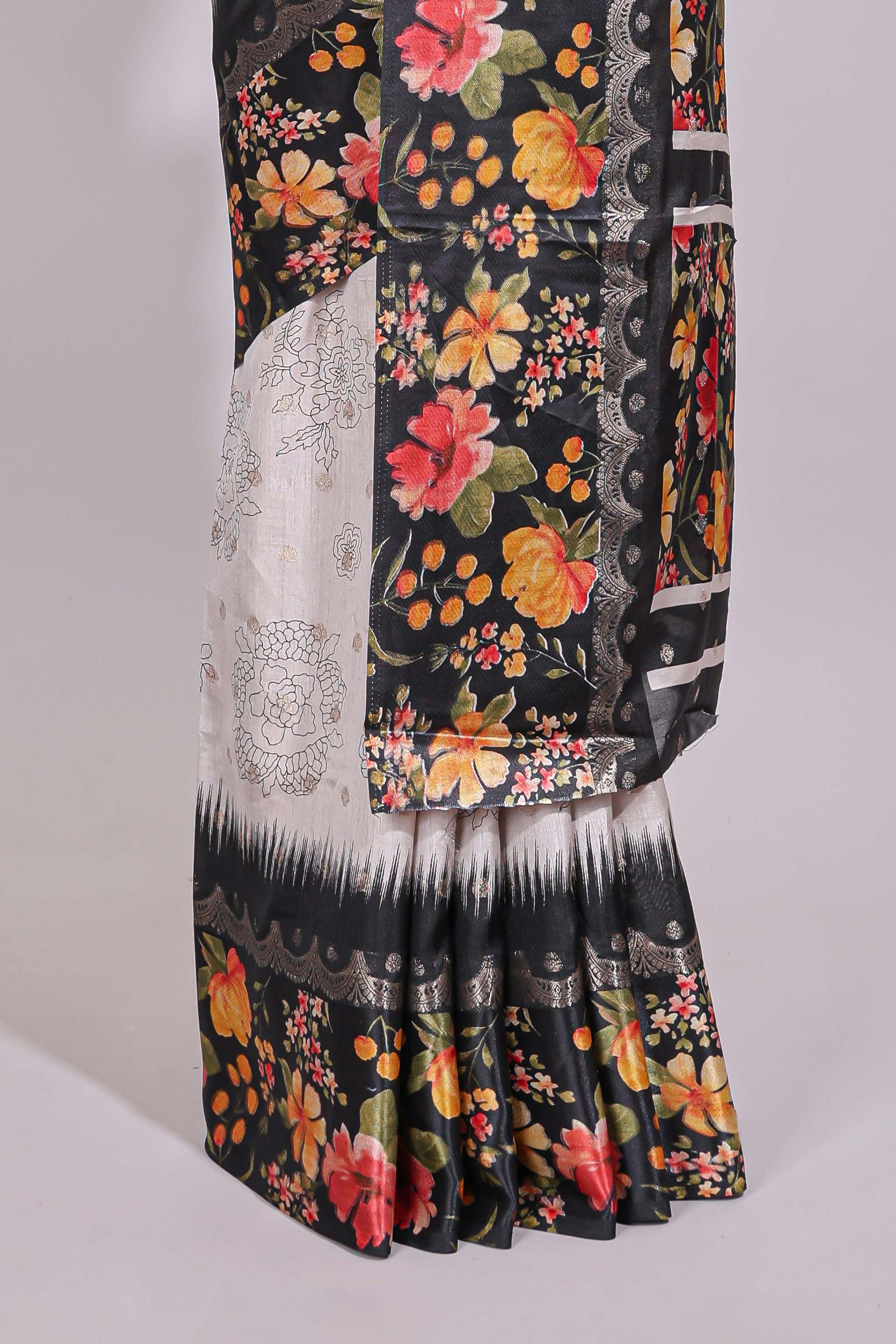 Off white floral design dola silk saree with contrast black border and printed motifs blouse