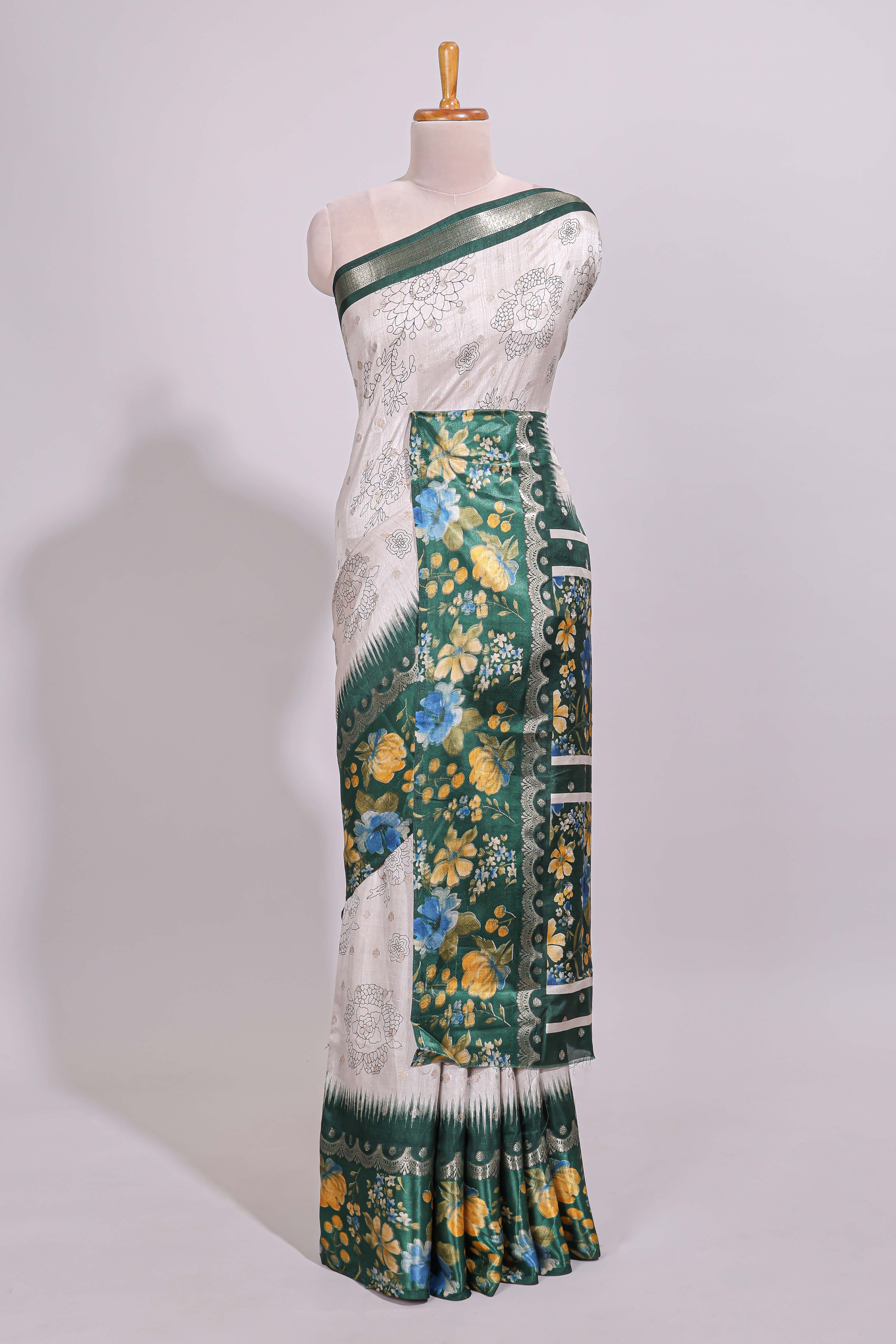 Off white floral design dola silk saree with contrast green border and printed motifs blouse