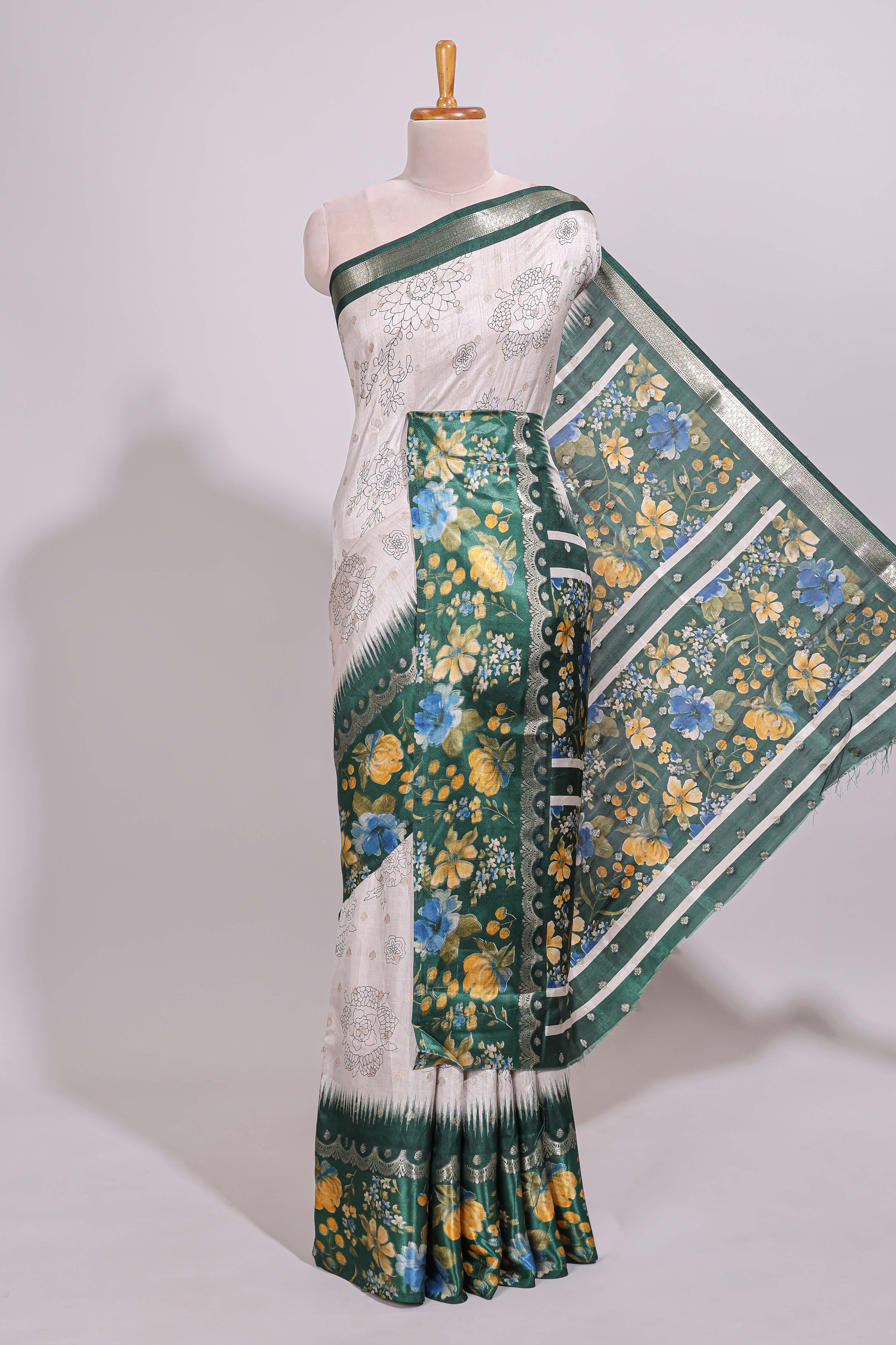 Off white floral design dola silk saree with contrast green border and printed motifs blouse