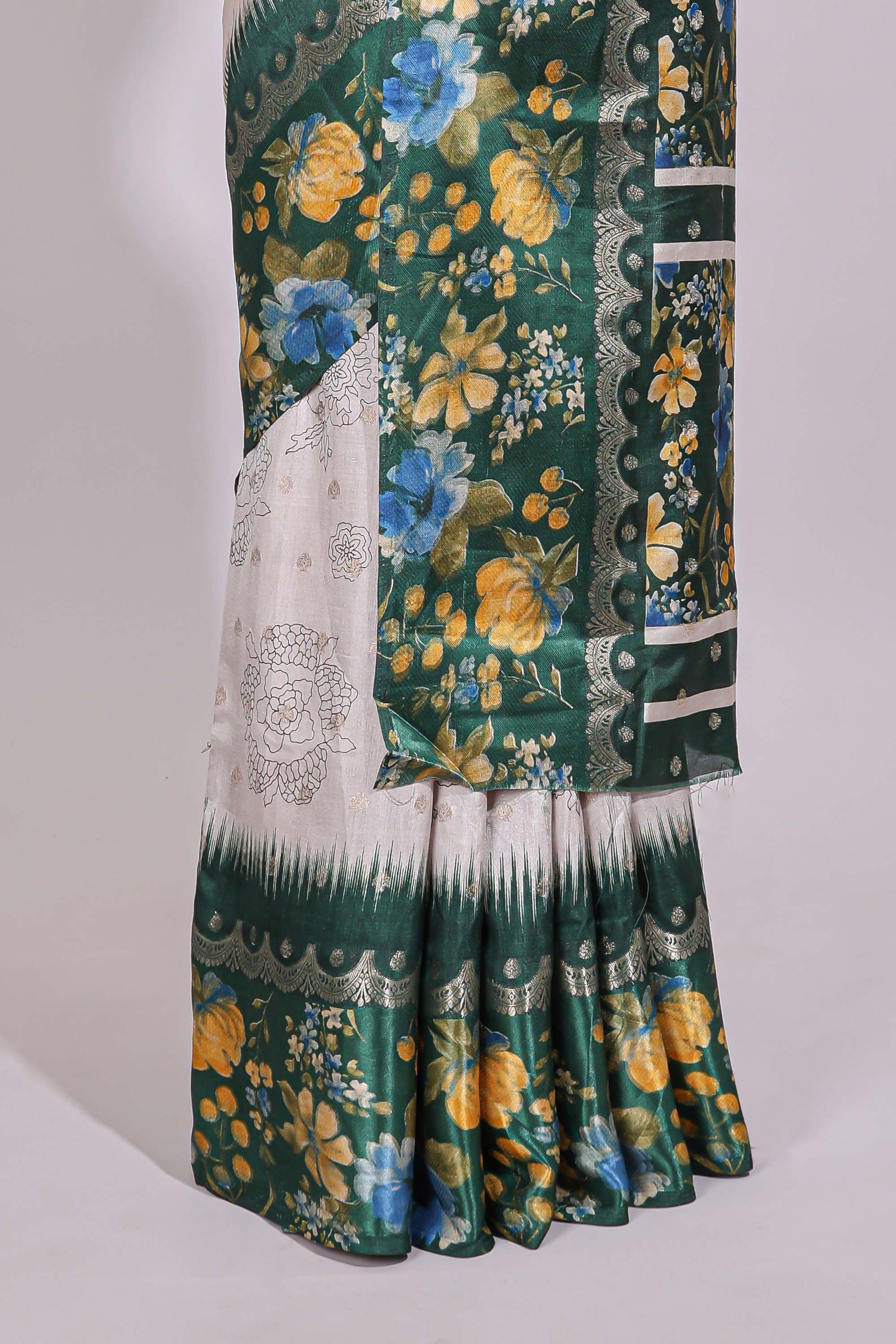 Off white floral design dola silk saree with contrast green border and printed motifs blouse