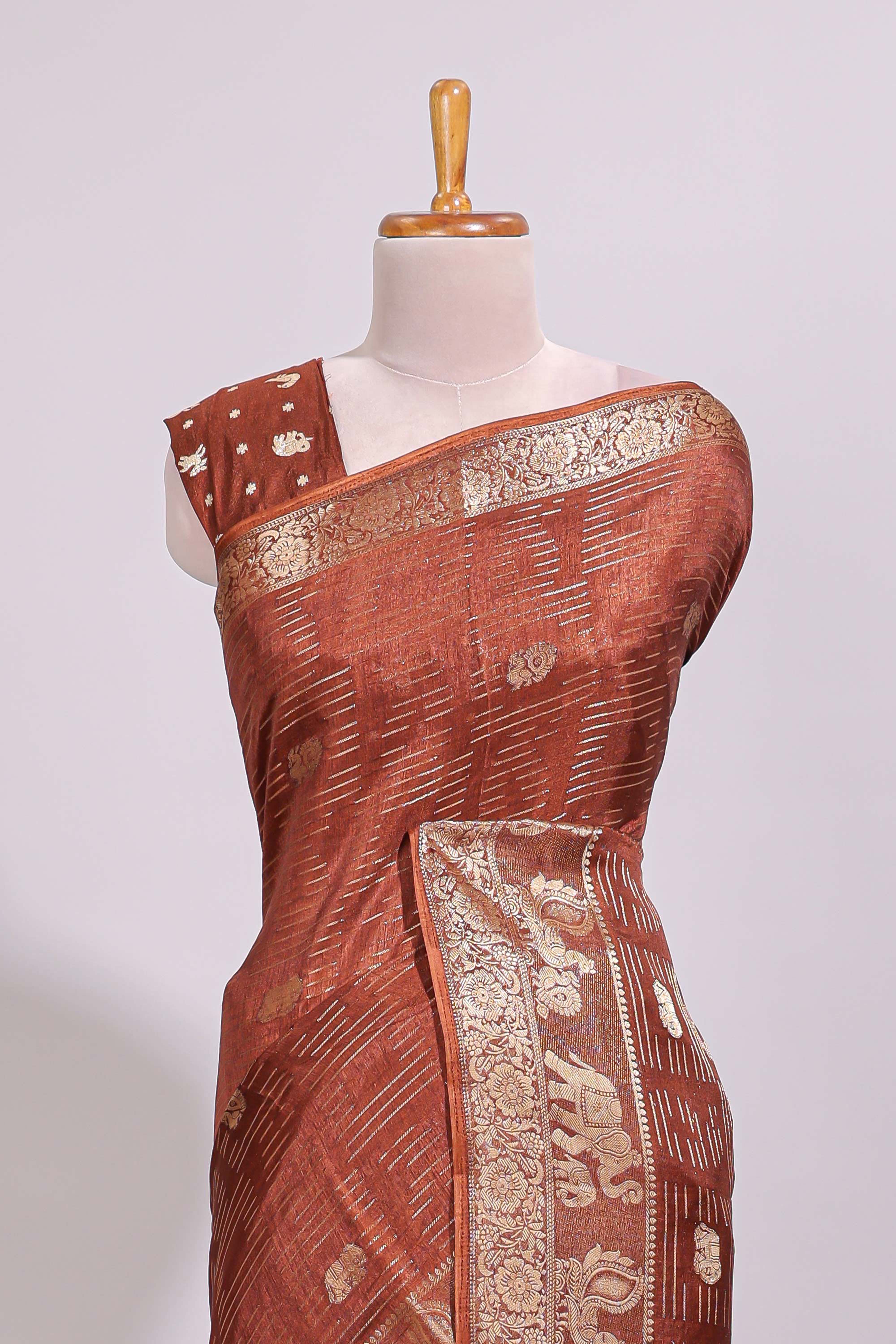 Rust brown striped elephant & bird zari butta dola silk saree with self zari border and matching zari motifs blouse