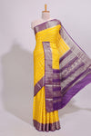 Yellow zari striped dola silk saree with contrast zari border and striped pallu