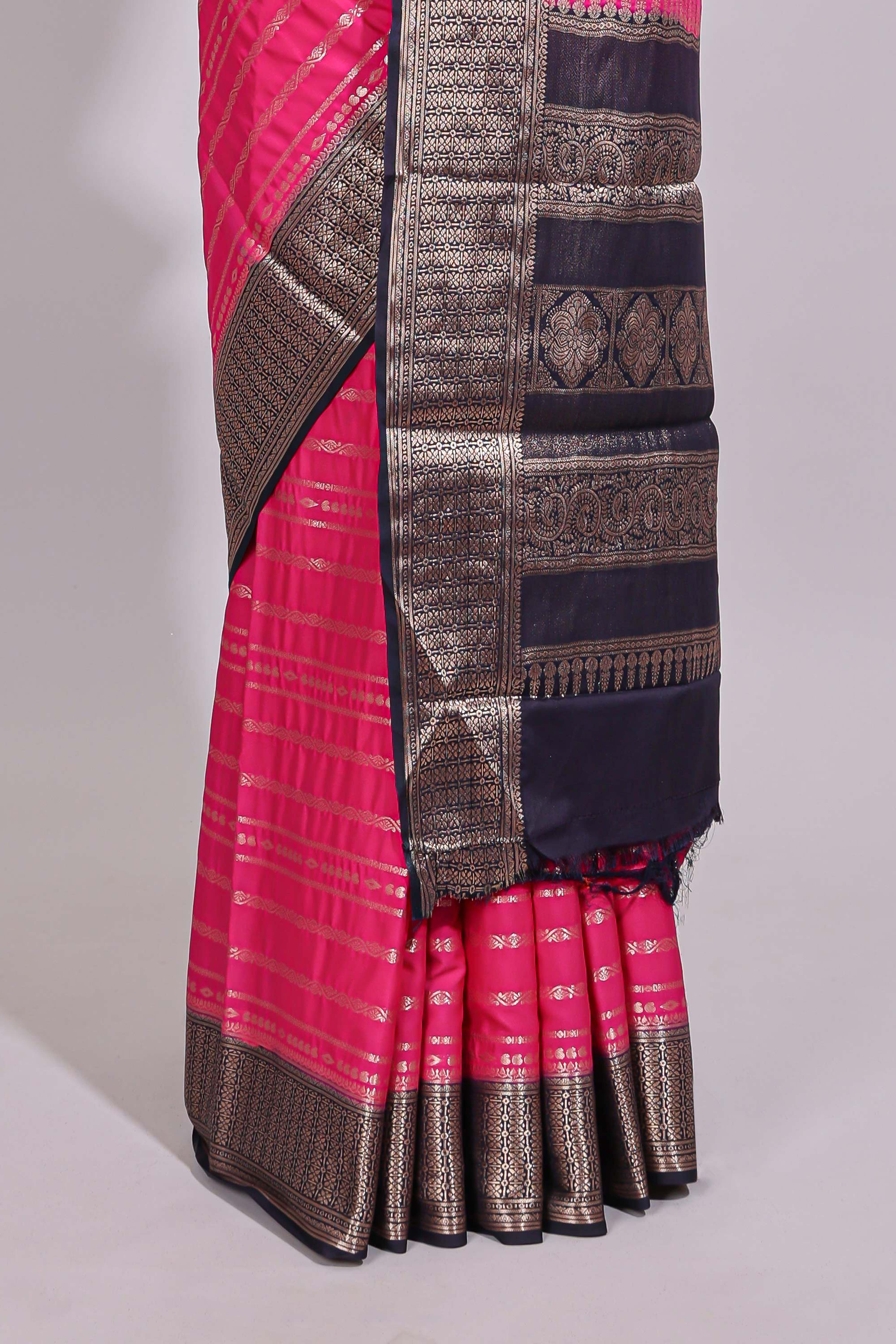 Pink zari striped dola silk saree with contrast zari border and striped pallu
