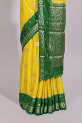 Yellow striped bird zari butta dola silk saree with contrast zari border and blouse