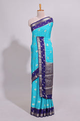Blue striped bird zari butta dola silk saree with contrast zari border and blouse