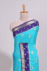 Blue striped bird zari butta dola silk saree with contrast zari border and blouse