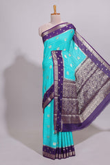 Turquoise blue striped bird zari butta dola silk saree with contrast zari border and blouse