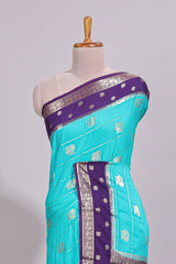 Turquoise blue striped bird zari butta dola silk saree with contrast zari border and blouse