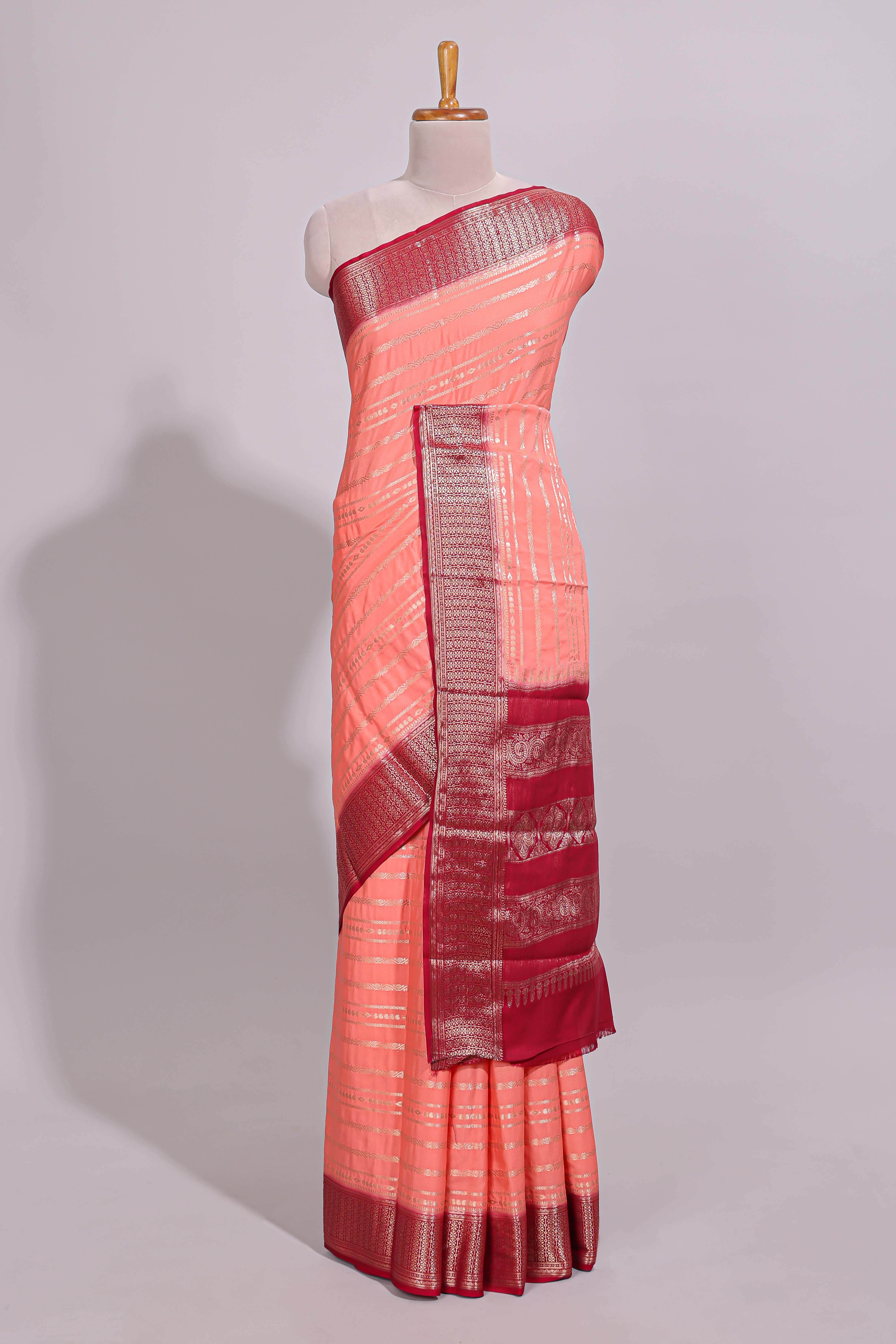 Peach zari striped dola silk saree with contrast zari border and striped pallu