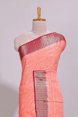 Peach zari striped dola silk saree with contrast zari border and striped pallu