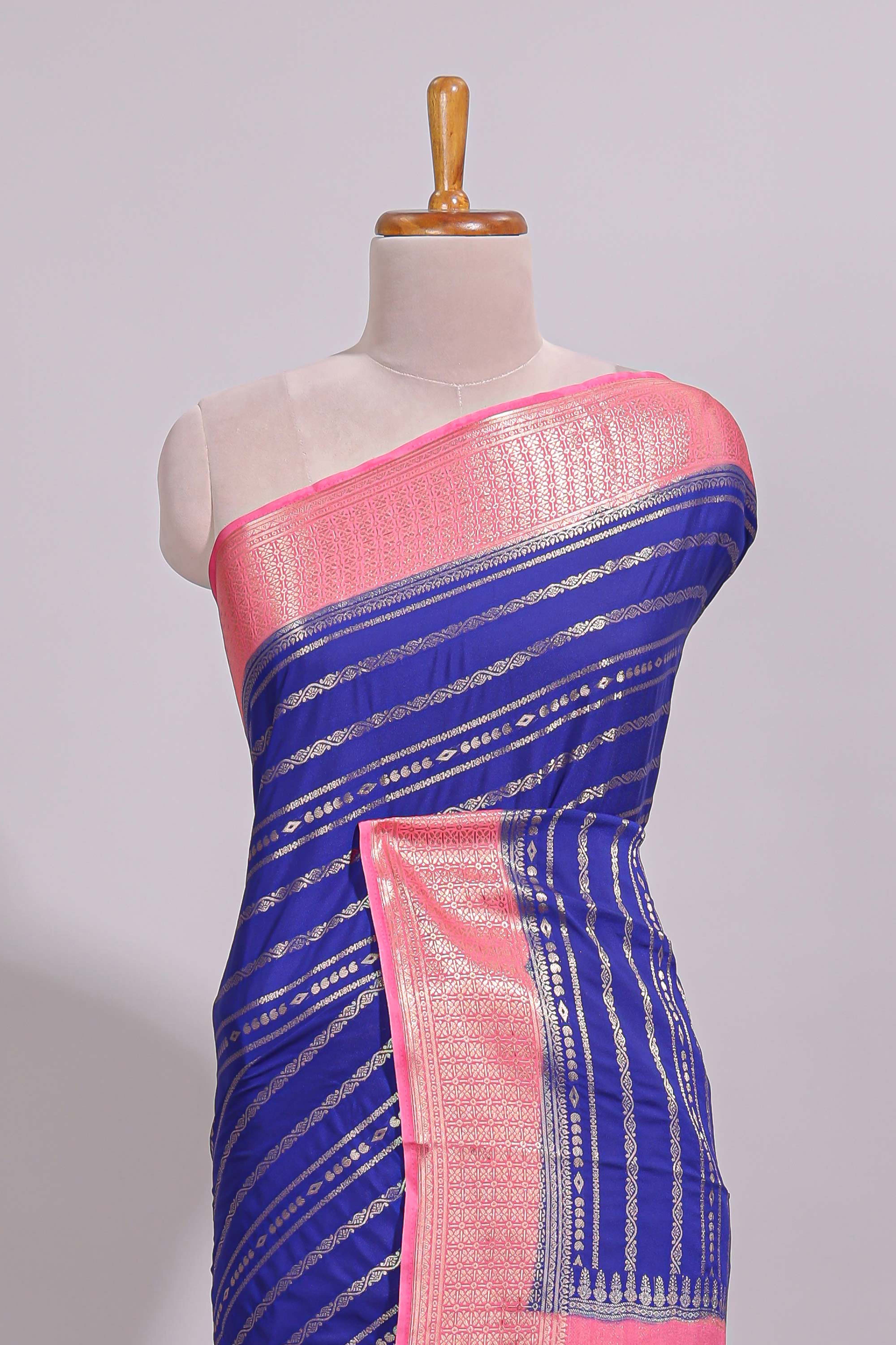 Blue zari striped dola silk saree with contrast zari border and striped pallu