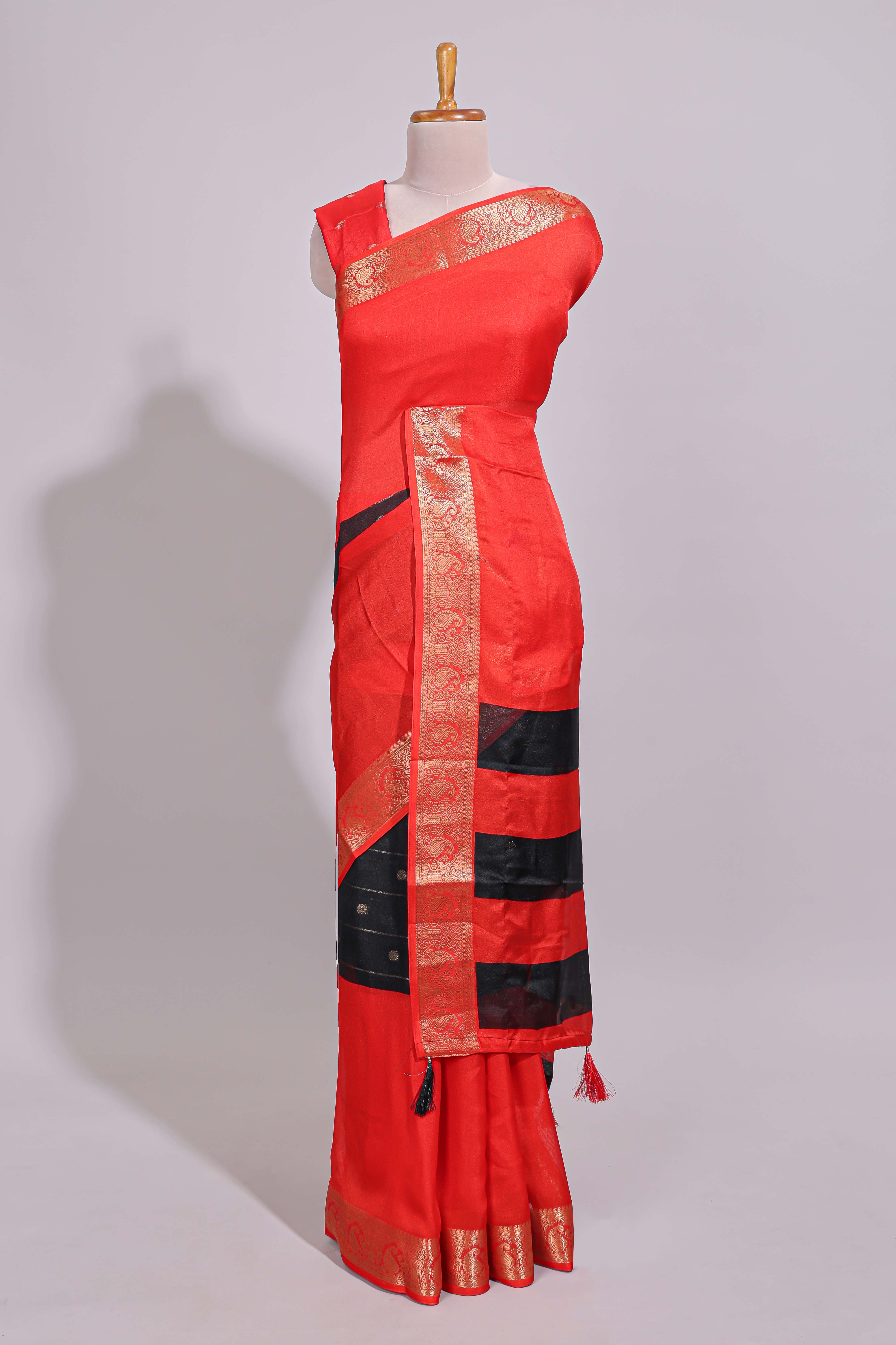 Black zari striped motifs dola silk saree with contrast red border and zari motifs blouse
