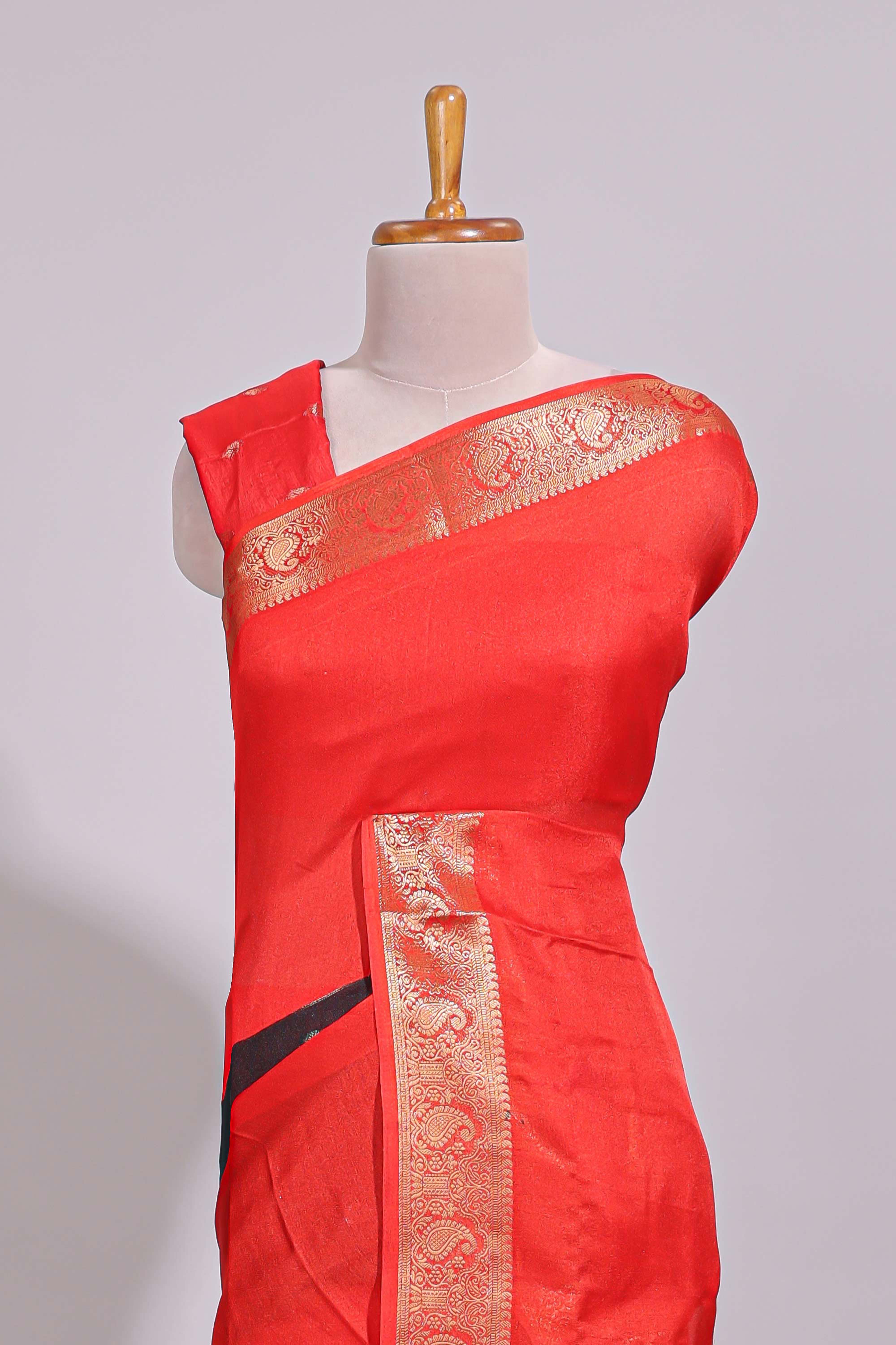 Black zari striped motifs dola silk saree with contrast red border and zari motifs blouse