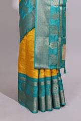 Yellow zari striped dola silk saree with contrast zari border and floral printed pallu