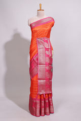 Orange zari striped dola silk saree with contrast zari border and floral printed pallu