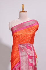 Orange zari striped dola silk saree with contrast zari border and floral printed pallu