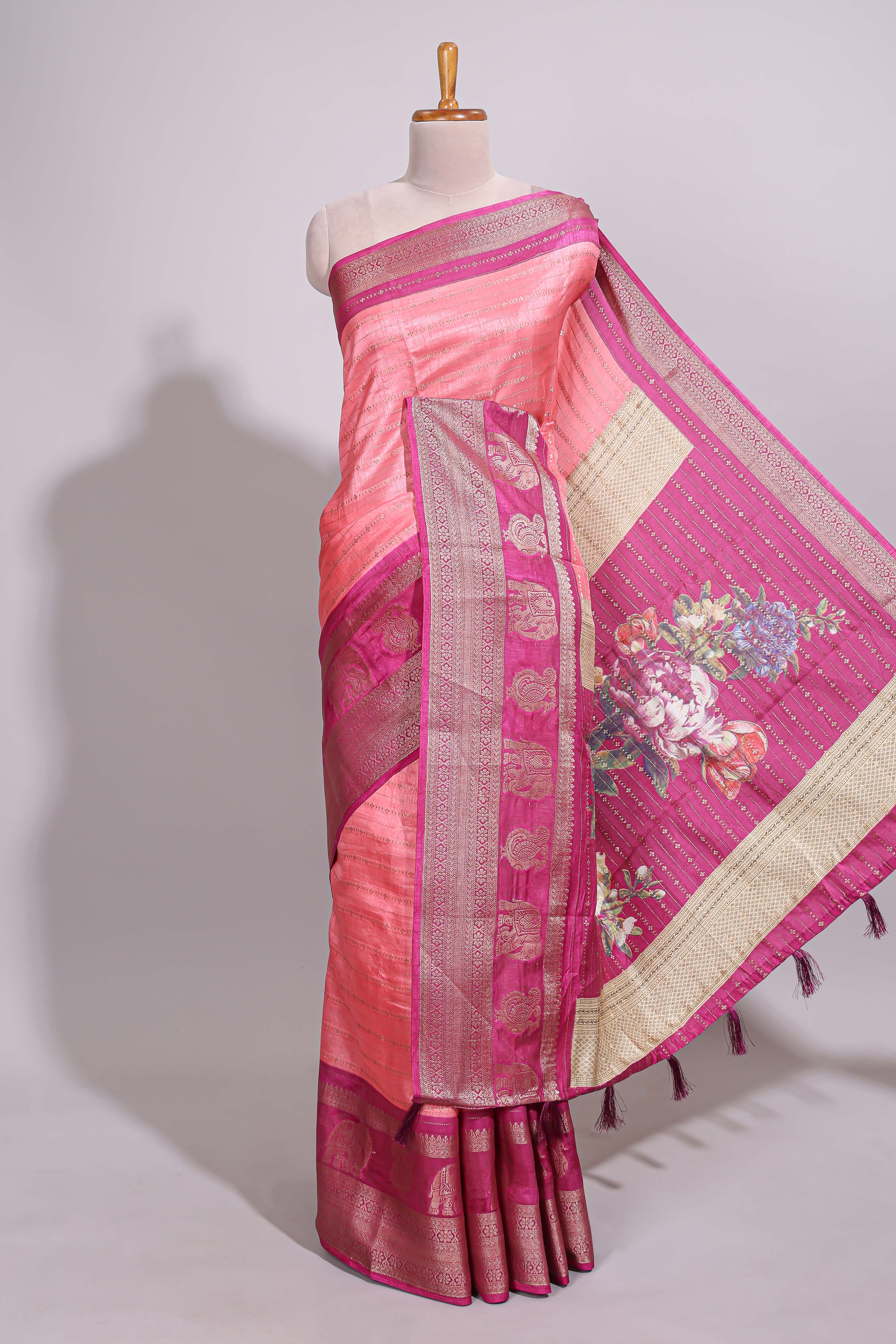 Peach zari striped dola silk saree with contrast zari border and floral printed pallu