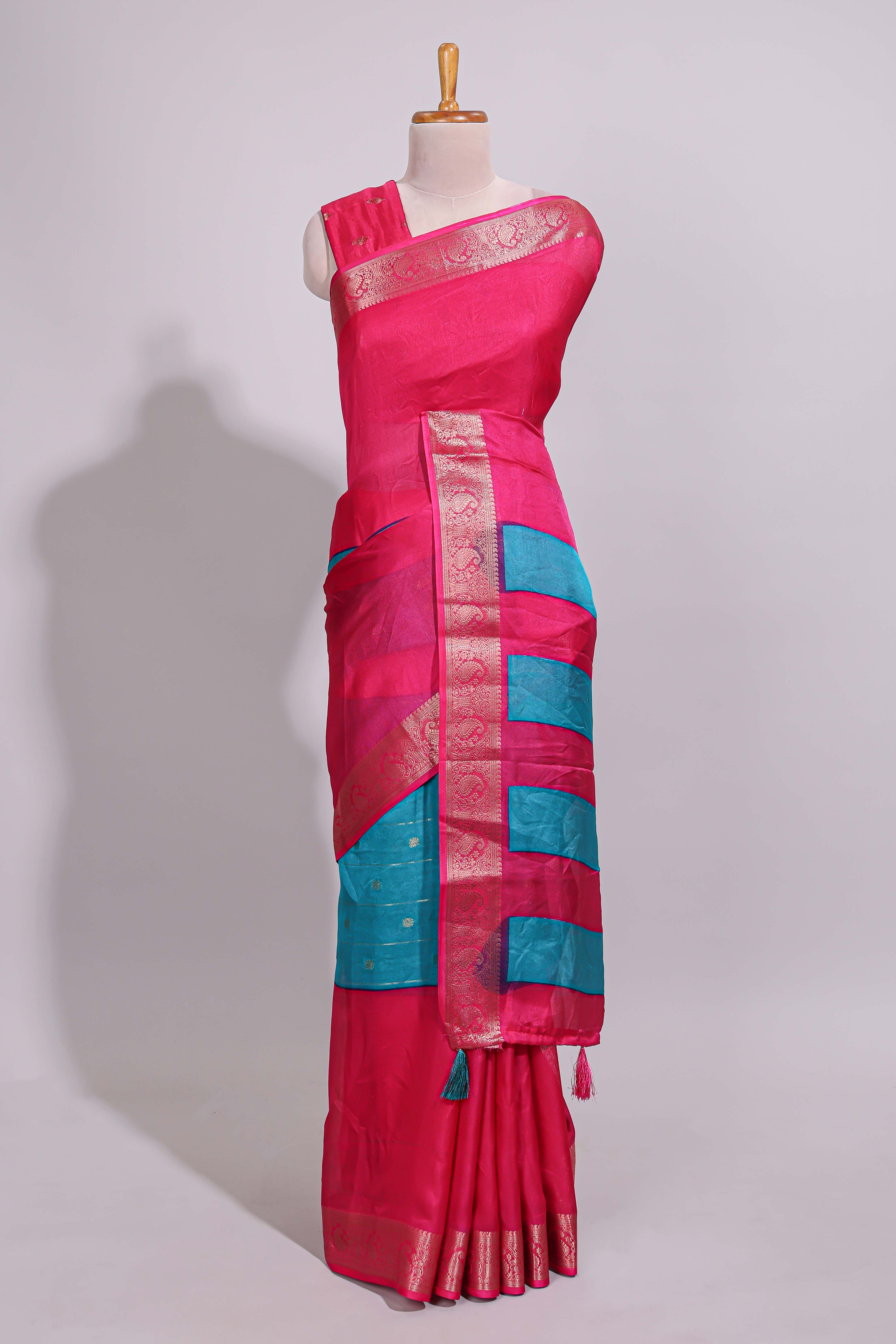 Turquoise blue zari striped motifs dola silk saree with contrast pink border and zari motifs blouse