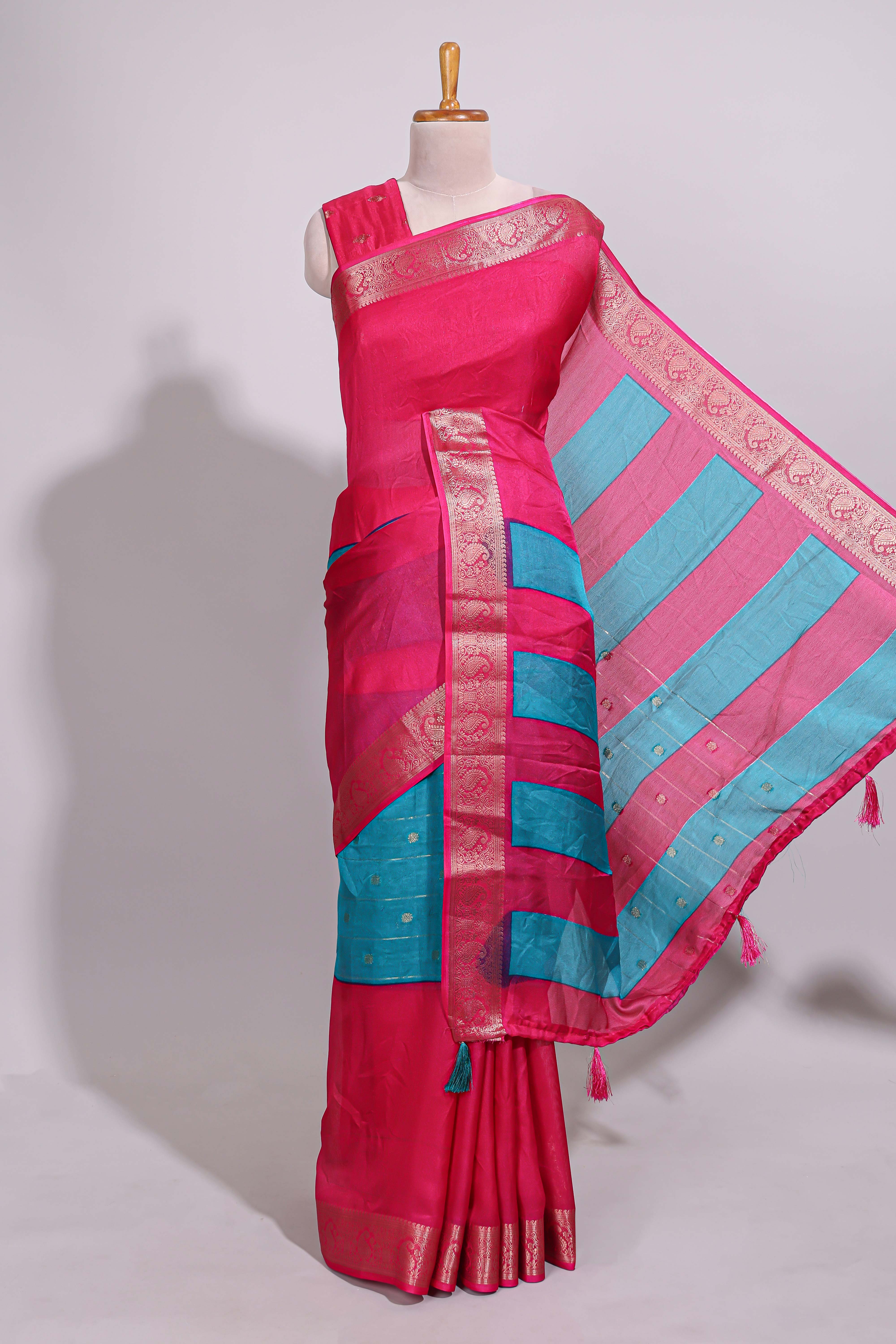 Turquoise blue zari striped motifs dola silk saree with contrast pink border and zari motifs blouse