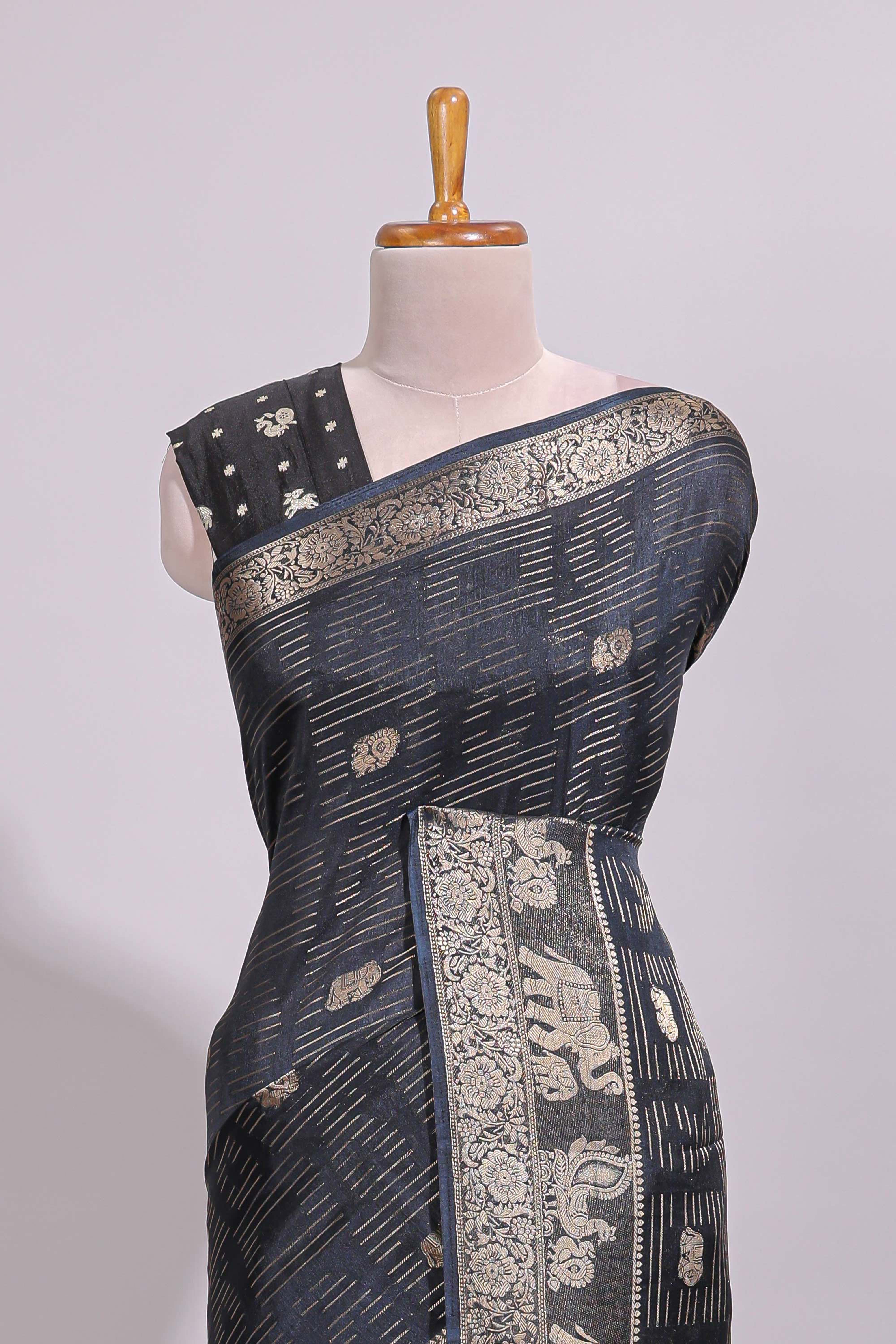 Black striped elephant & bird zari butta dola silk saree with self zari border and matching zari motifs blouse