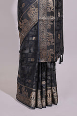 Black striped elephant & bird zari butta dola silk saree with self zari border and matching zari motifs blouse