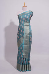 Peacock green zari butta dola silk saree with self zari border and matching zari motifs blouse