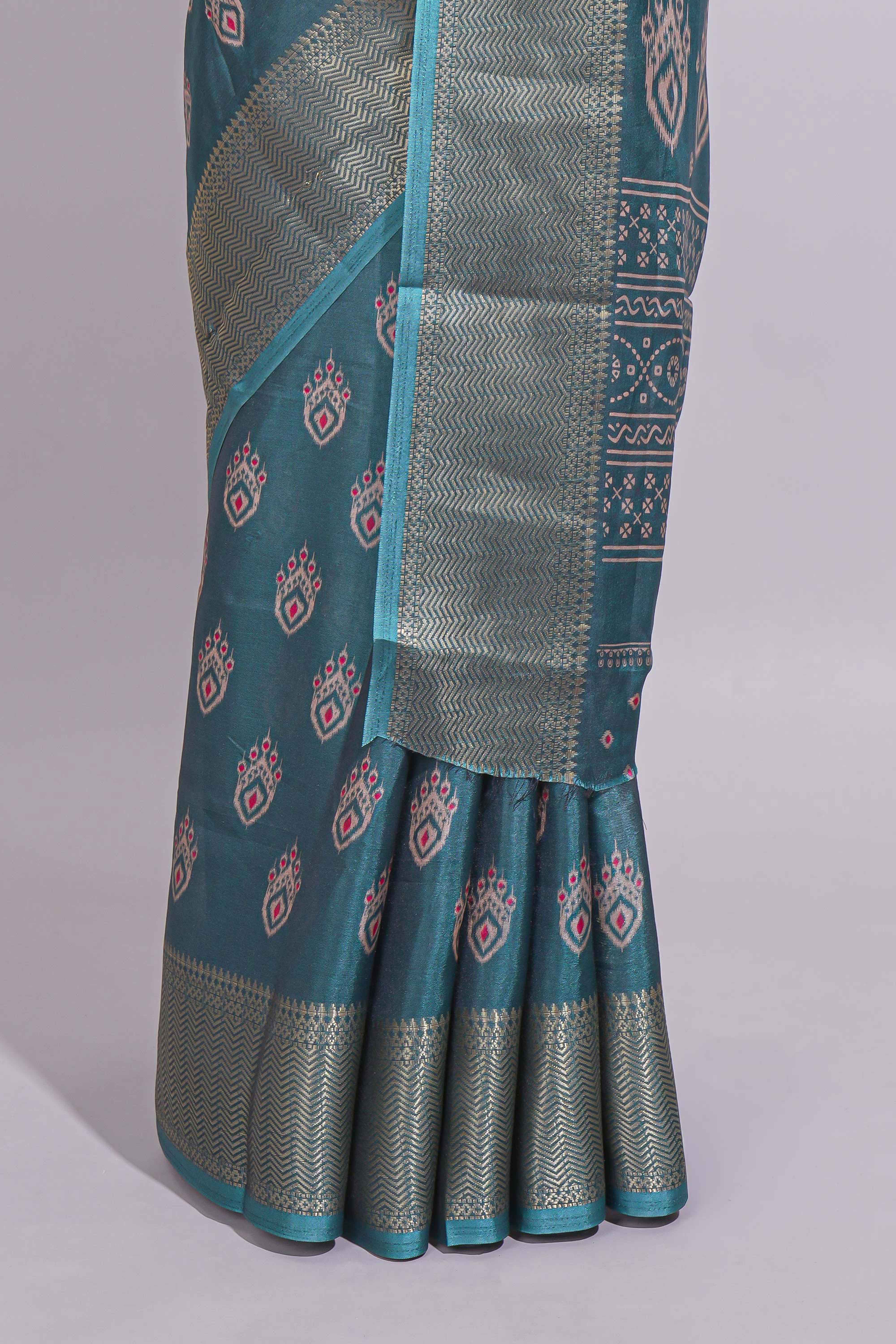 Peacock green zari butta dola silk saree with self zari border and matching zari motifs blouse