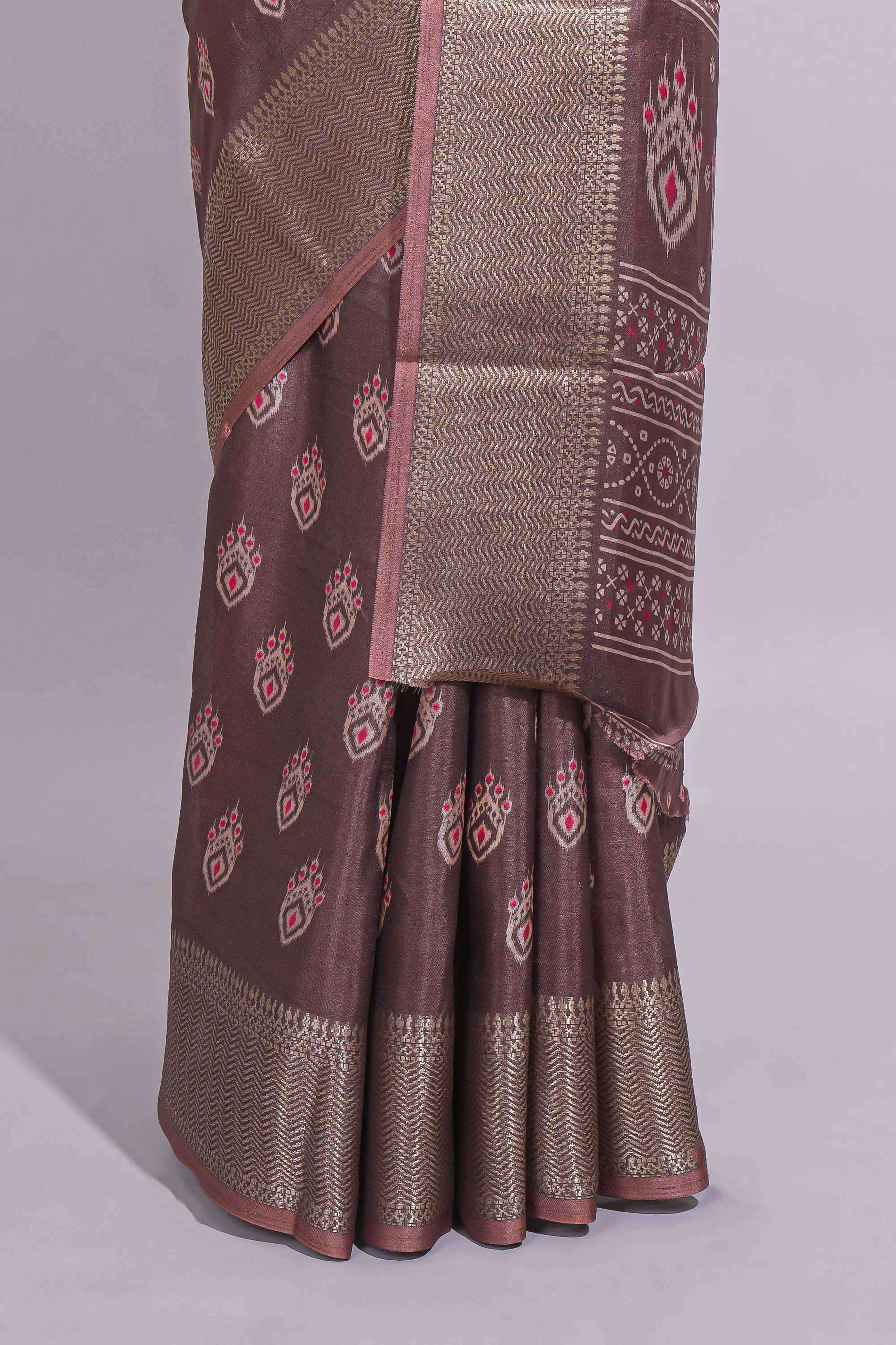 Brown dola silk saree with all over butta self zari border and matching zari motifs blouse