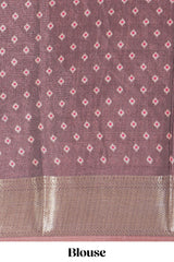 Brown dola silk saree with all over butta self zari border and matching zari motifs blouse