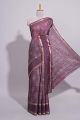 Plum Purple Dola Silk Saree Floral Motifs with Zari Border and matching printed blouse