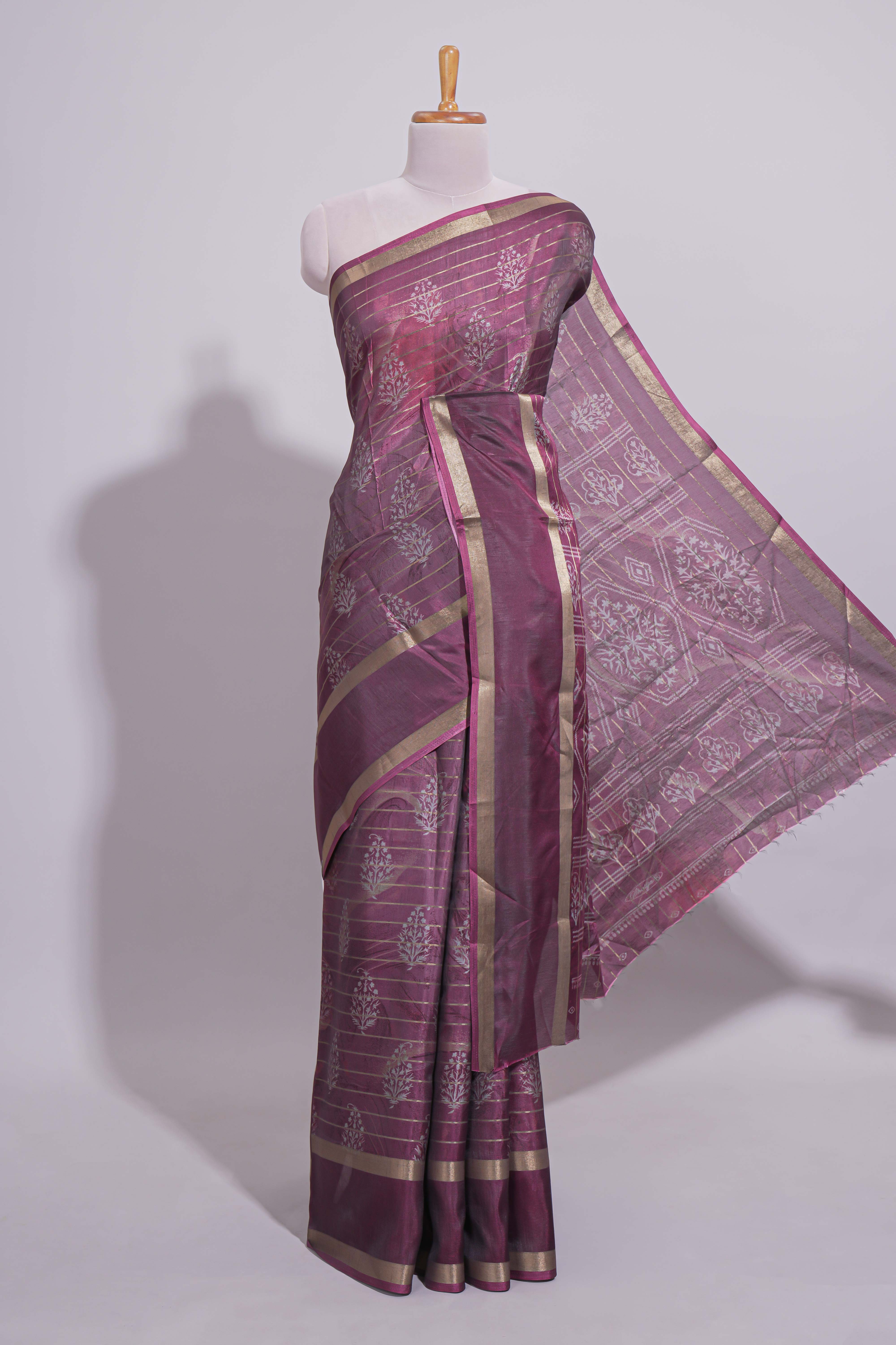 Plum Purple Dola Silk Saree Floral Motifs with Zari Border and matching printed blouse