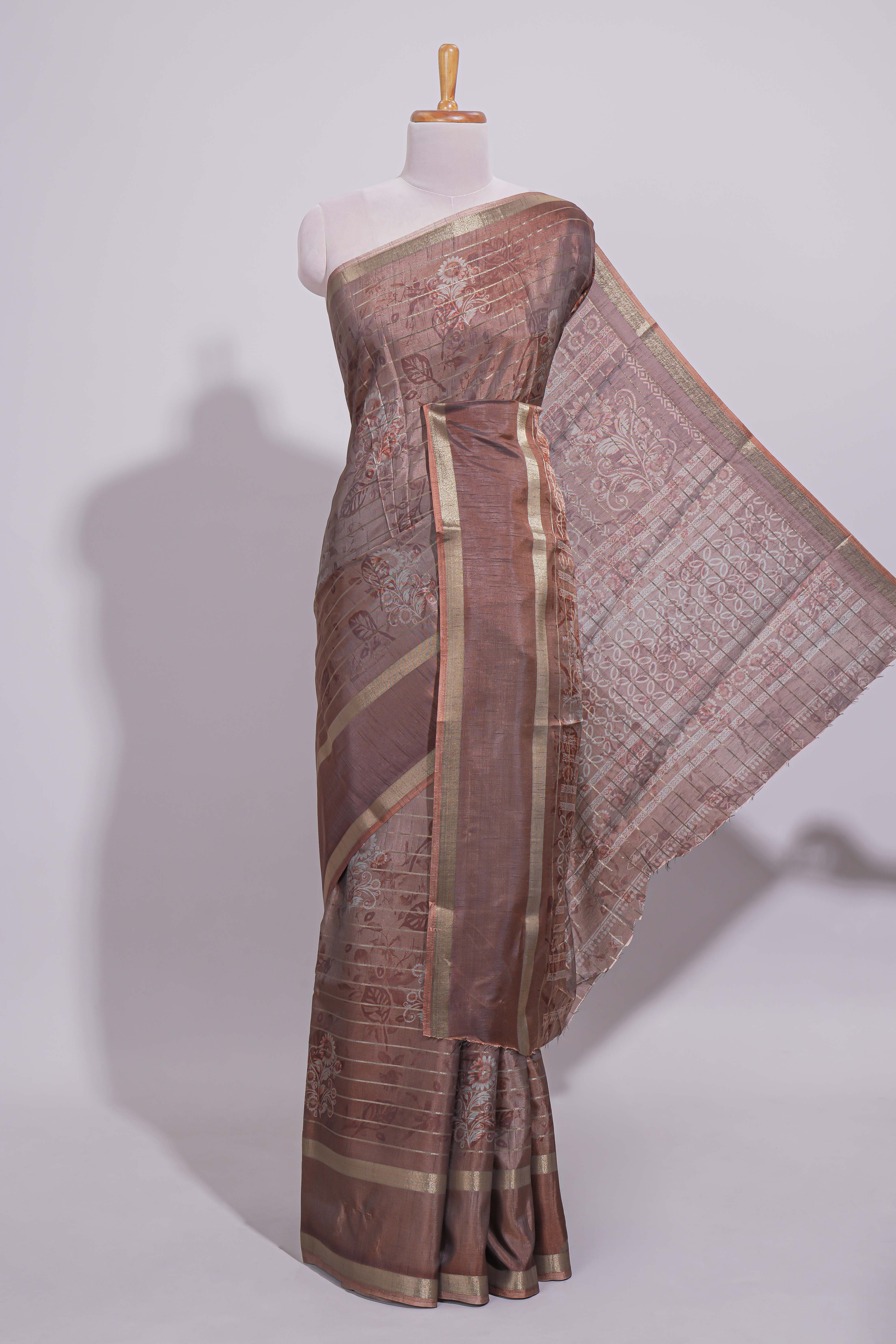 Brown Dola Silk Saree all over floral motifs fine zari stripes and zari border with matching printed blouse