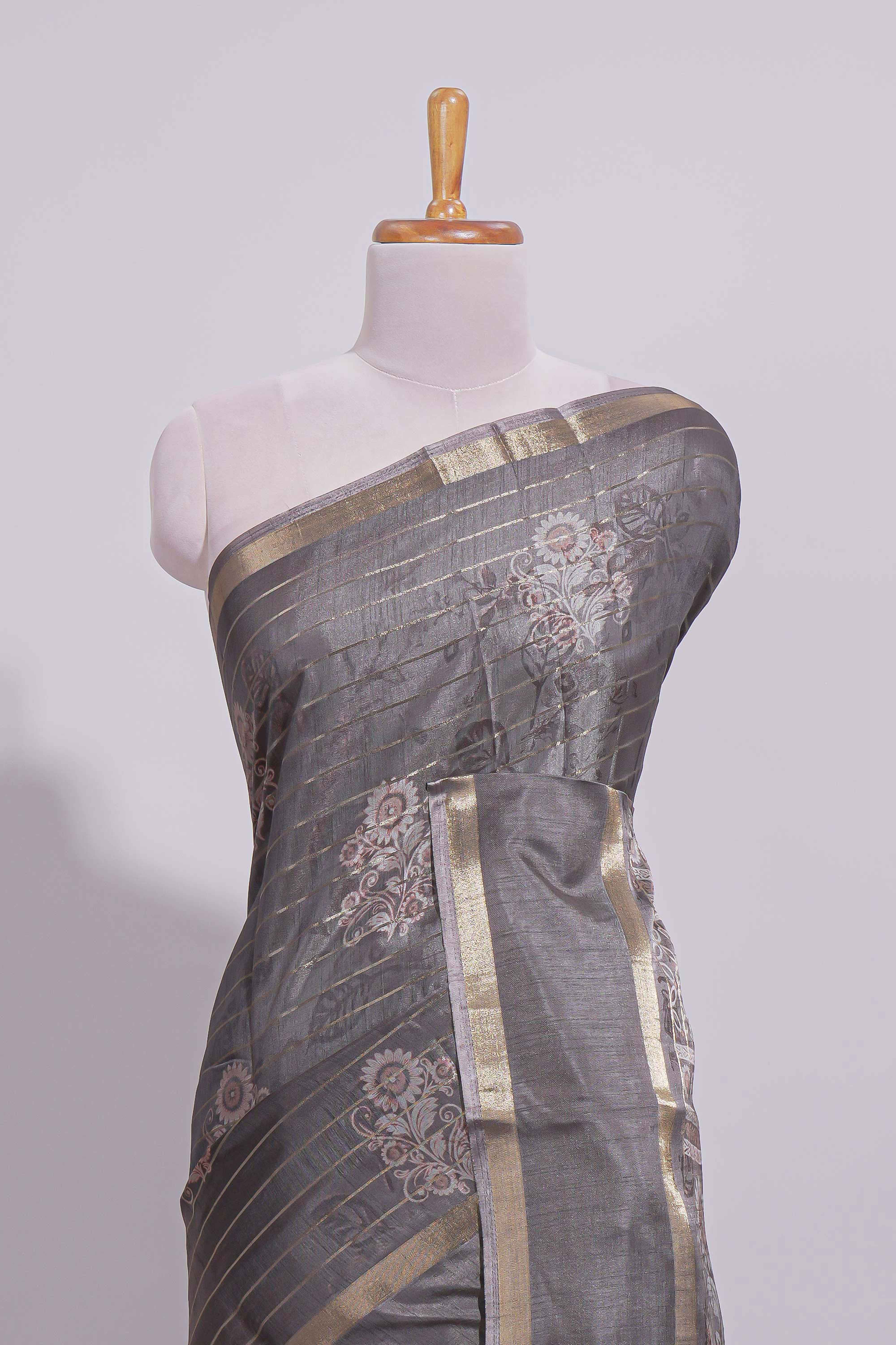 Charcoal Grey Dola Silk Saree all over floral motifs fine zari stripes and zari border with matching printed blouse