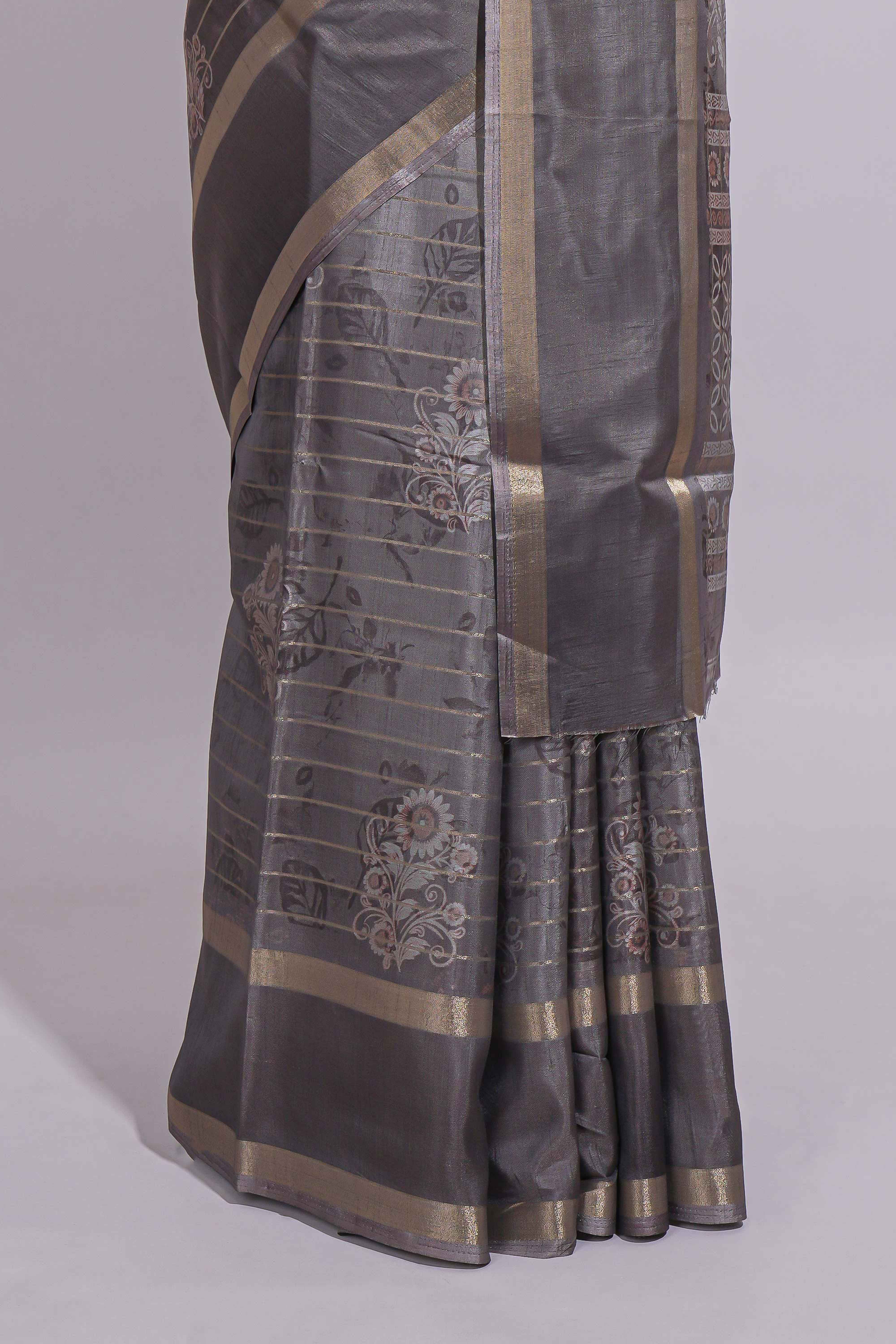 Charcoal Grey Dola Silk Saree all over floral motifs fine zari stripes and zari border with matching printed blouse