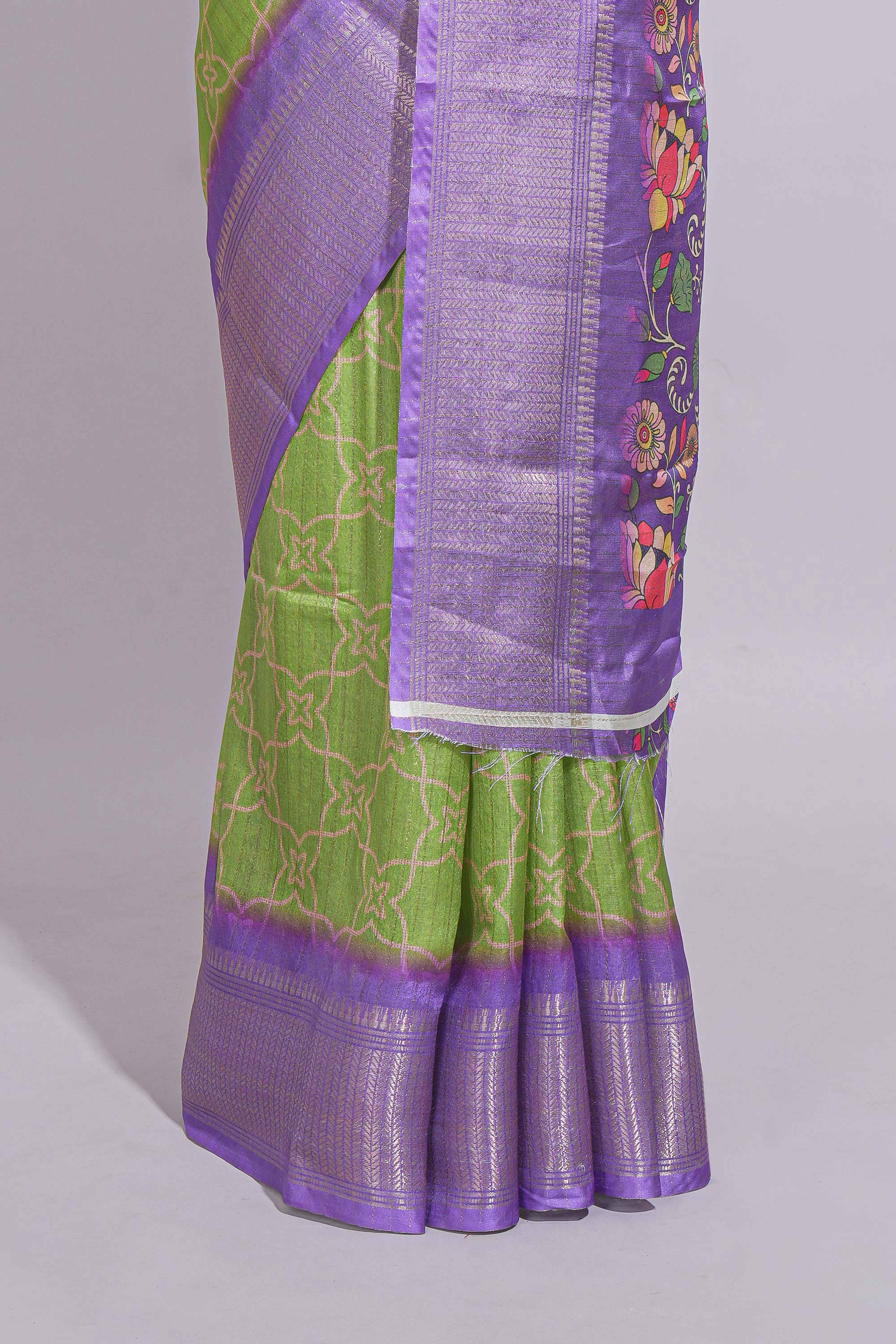 Green striped zari design dola silk saree with contrast zari border and floral design blouse