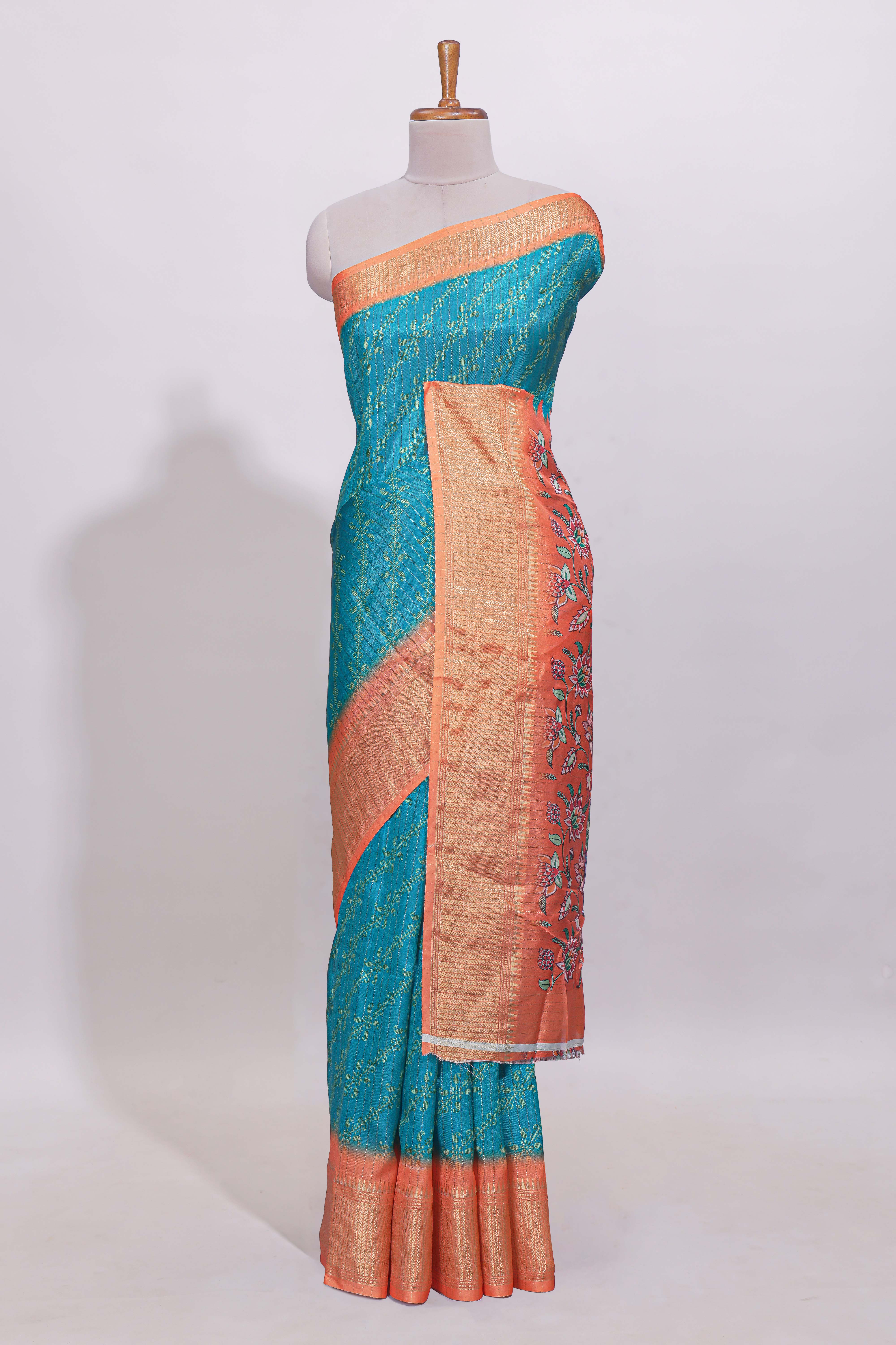 Teal blue striped dola Saree with contrast border and floral pallu along with contrast blouse