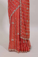 Peach floral design chamki work designer saree with self scallop border and matching blouse