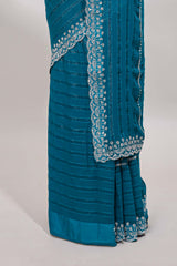 Bondi blue striped design stone work designer saree with self scallop border and matching blouse