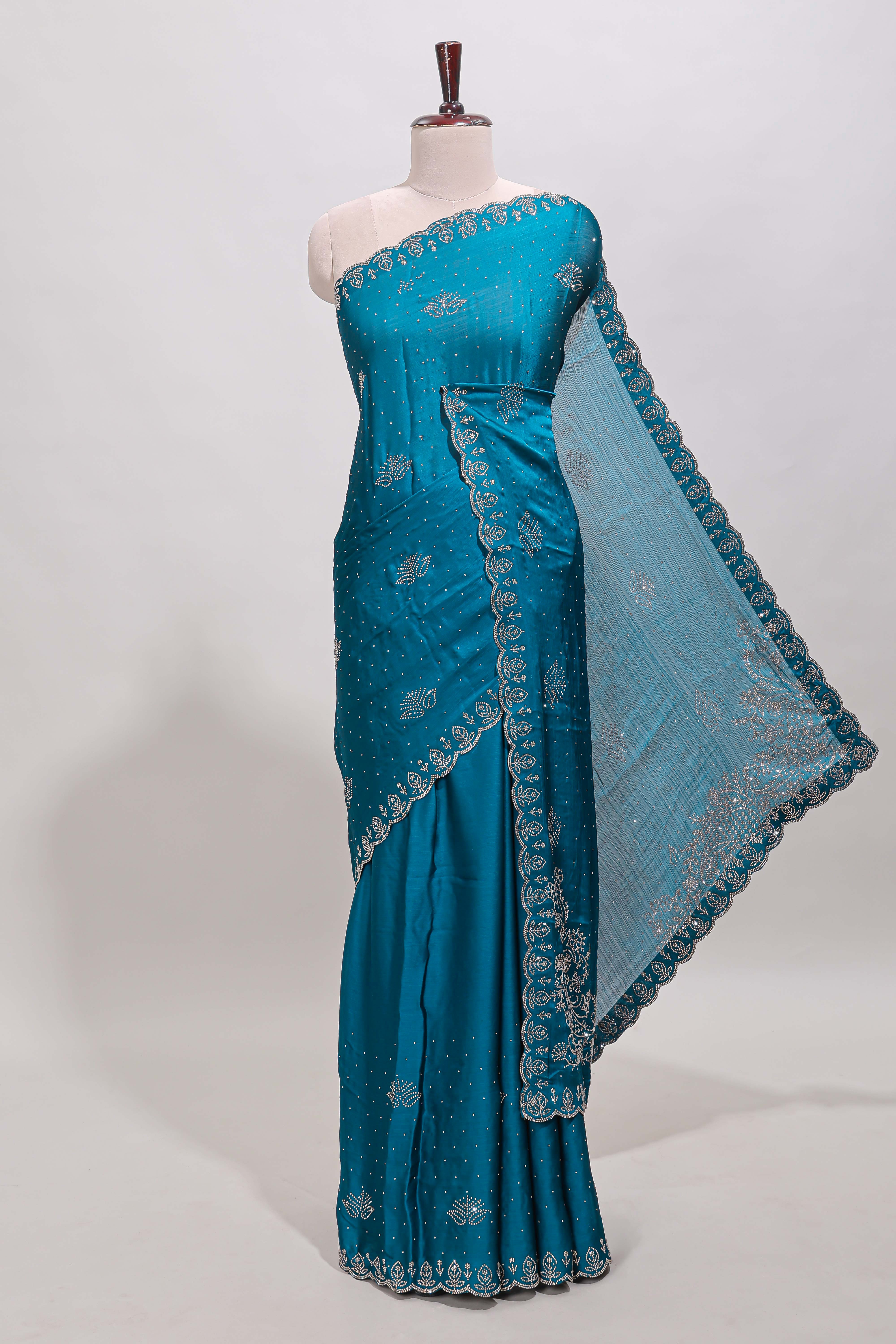 Midight green floral motifs design stone work designer saree with self floral scallop border and matching blouse