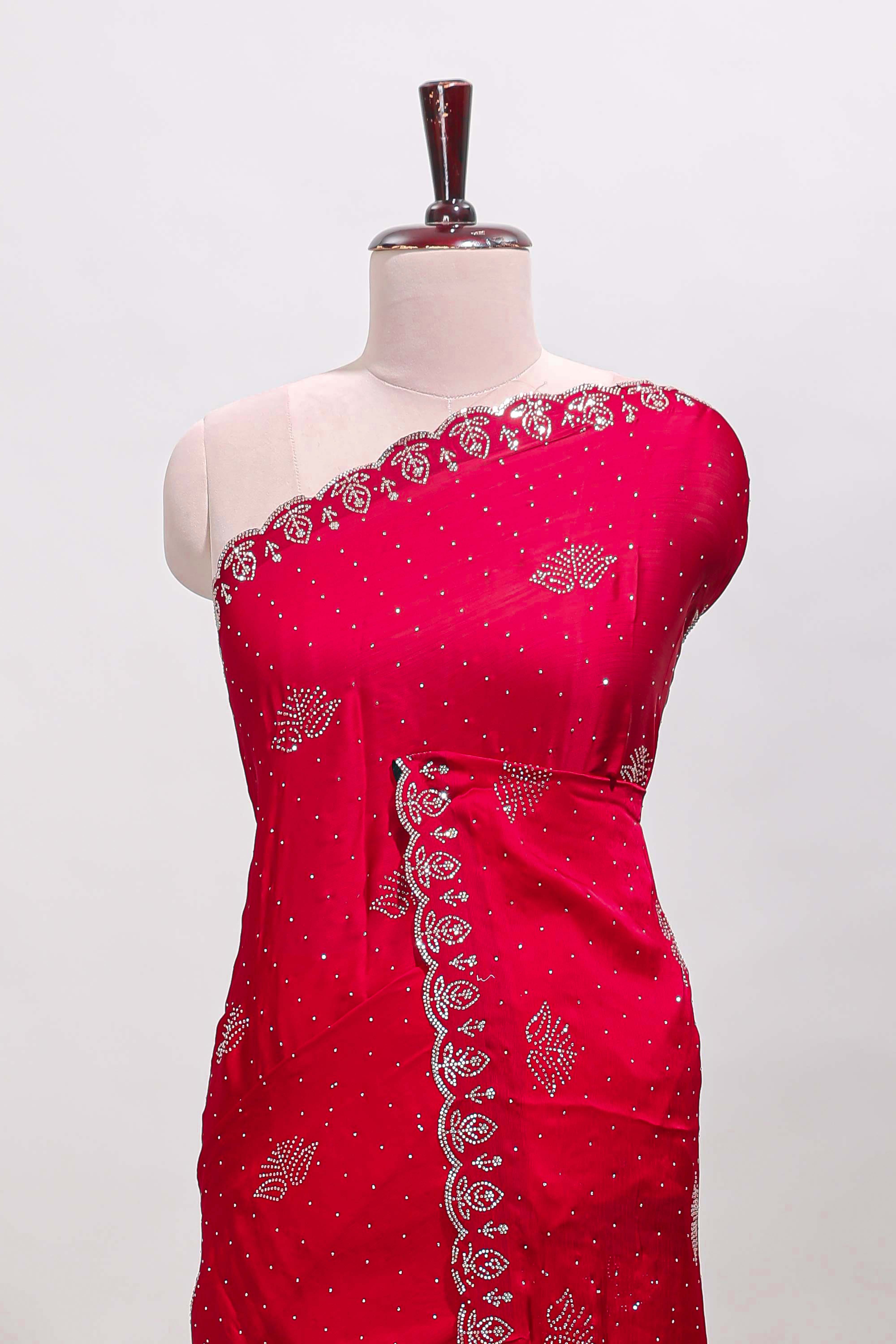 Rani pink floral motifs design stone work designer saree with self floral scallop border and matching blouse
