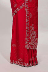 Rani pink floral motifs design stone work designer saree with self floral scallop border and matching blouse