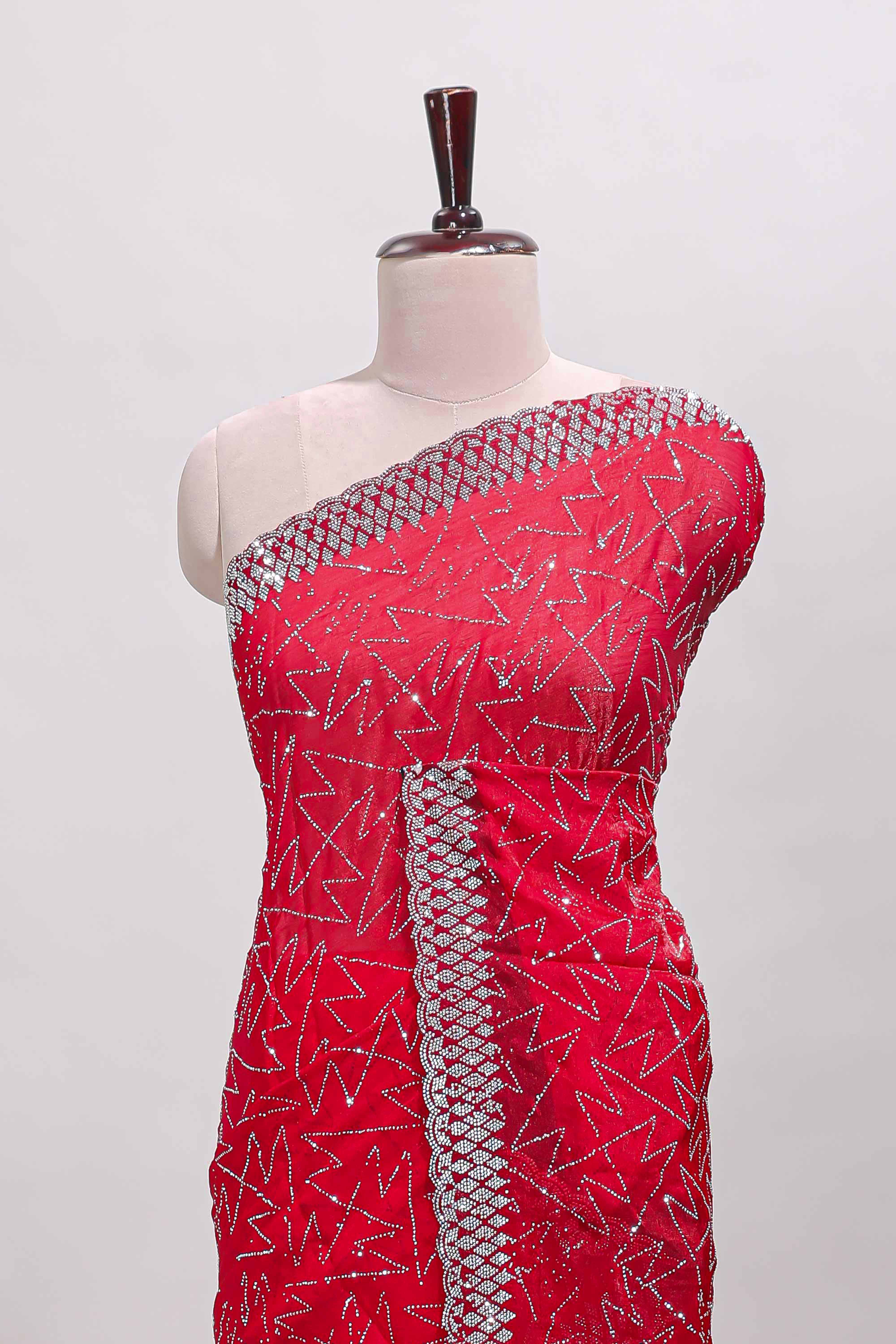 Pink geometric design stone work designer saree with self scallop border and matching blouse