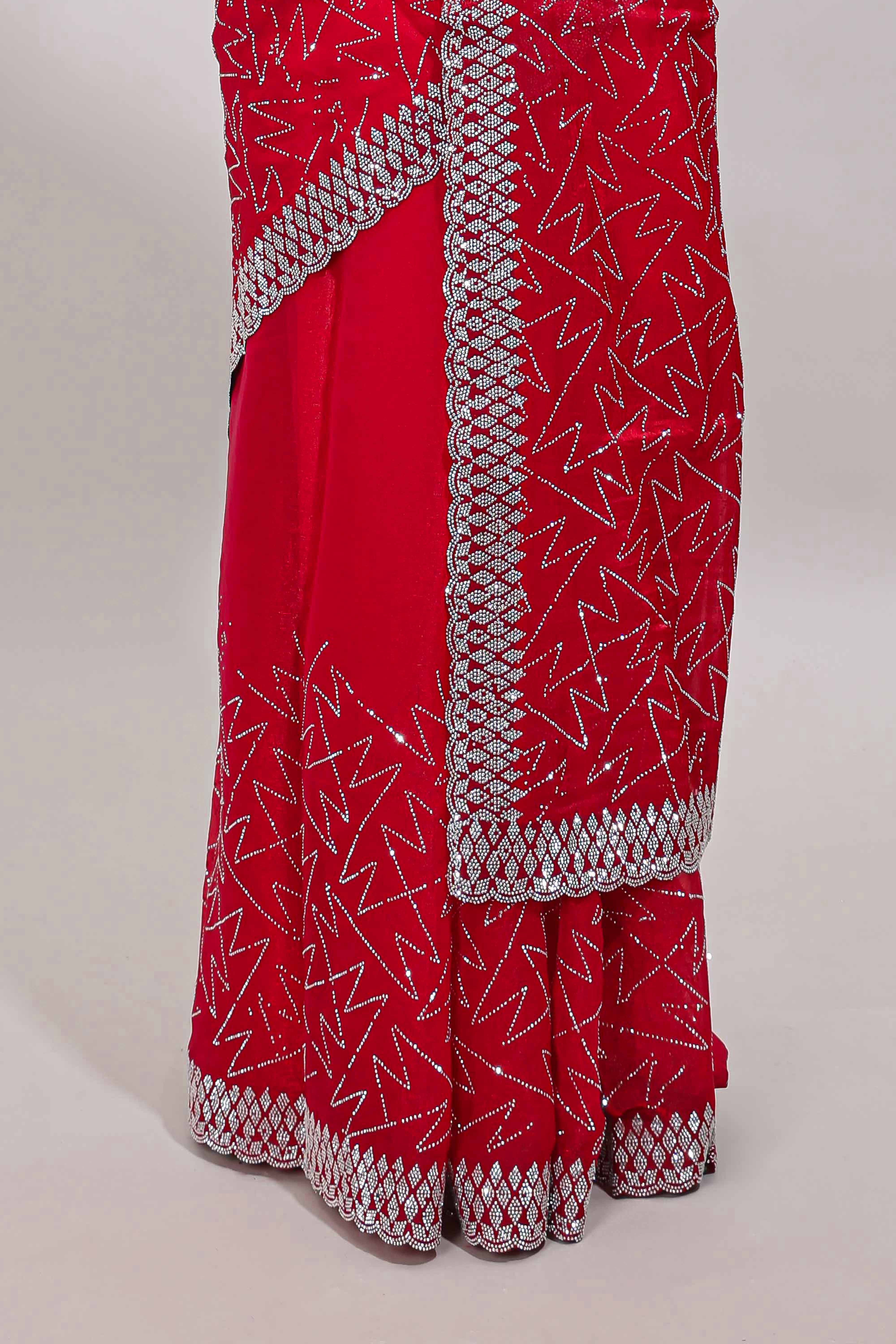Pink geometric design stone work designer saree with self scallop border and matching blouse