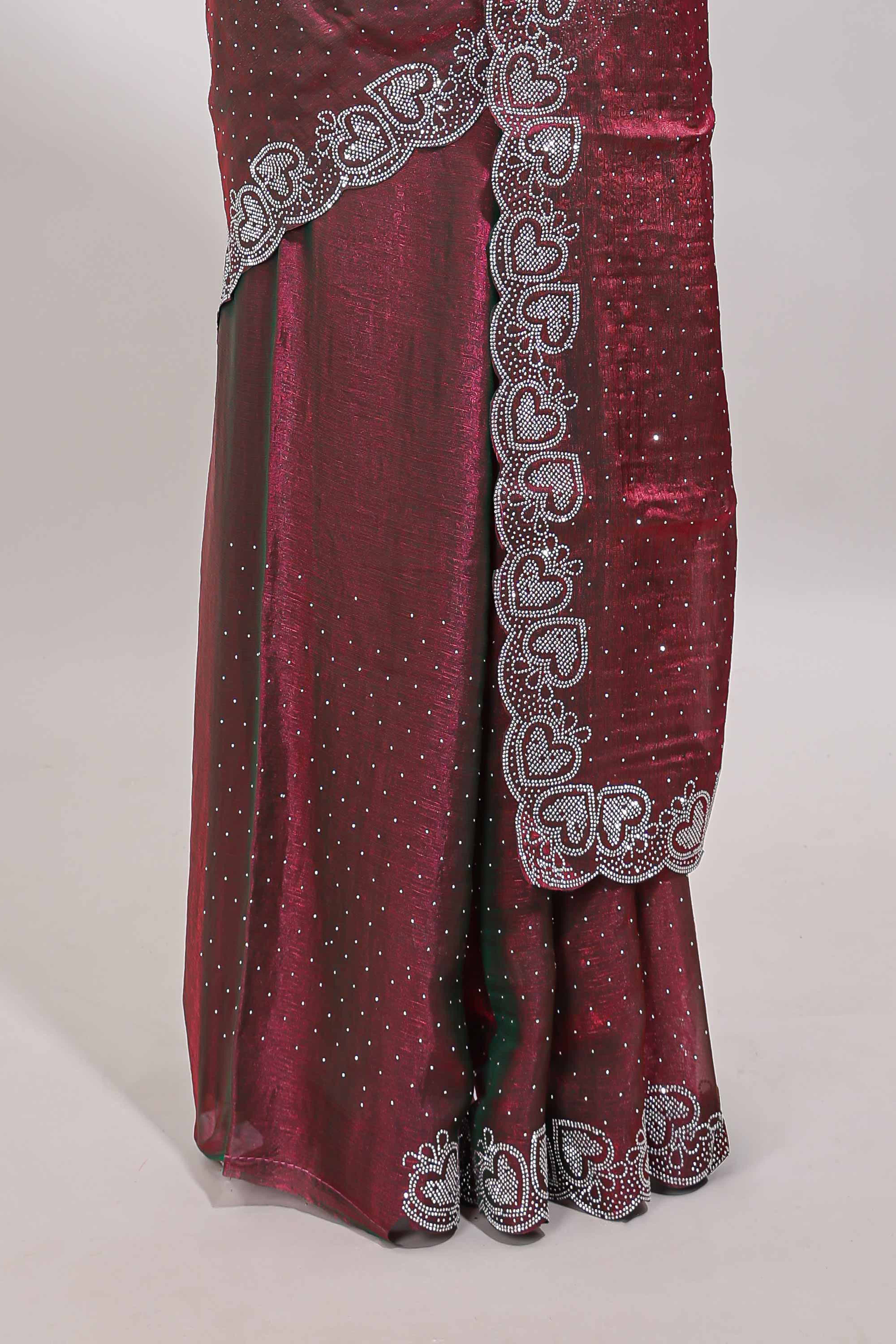 Maroon stone work designer saree with self heartin design scallop border and matching blouse