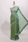Green stone work designer saree with self heartin design scallop border and matching blouse