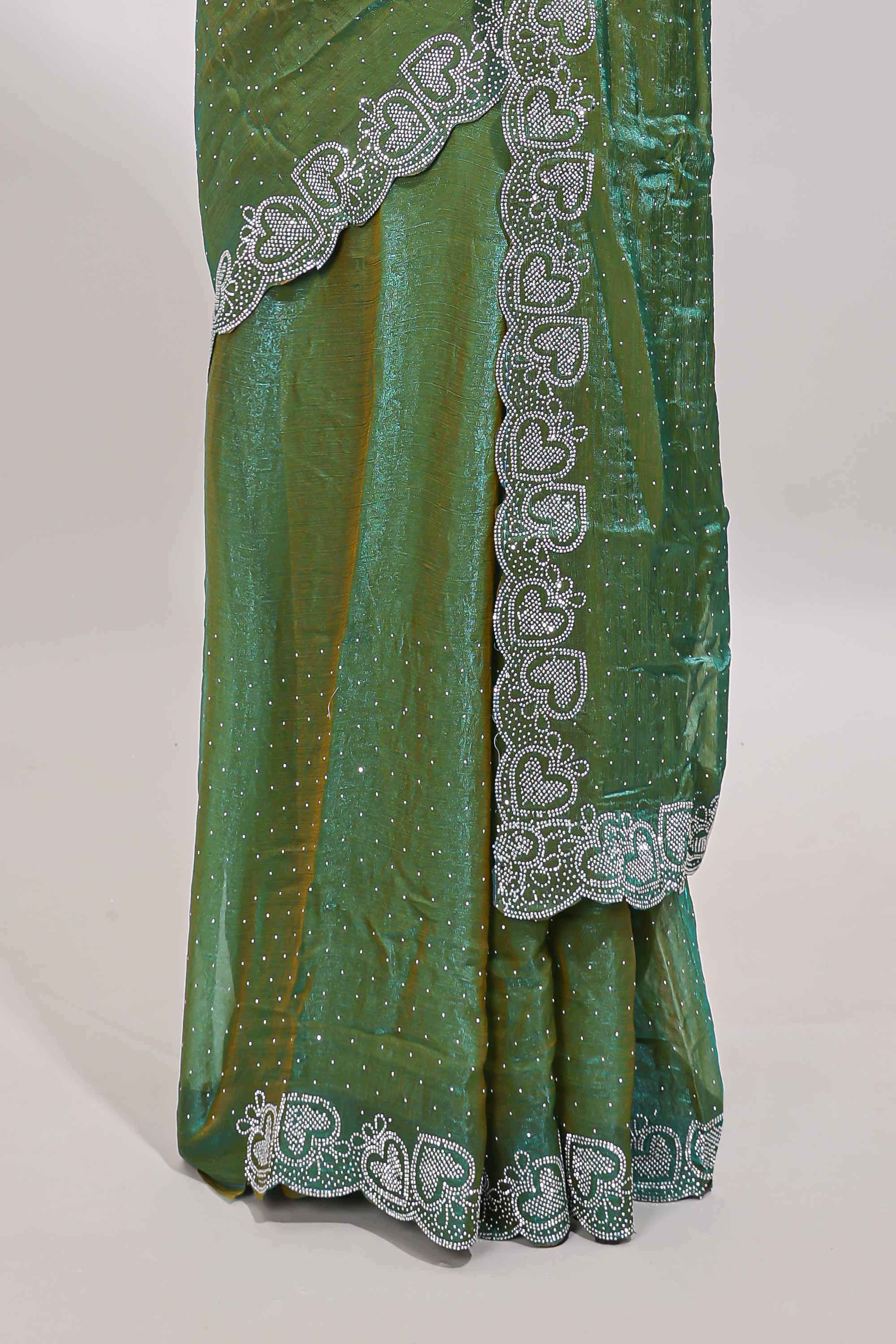 Green stone work designer saree with self heartin design scallop border and matching blouse