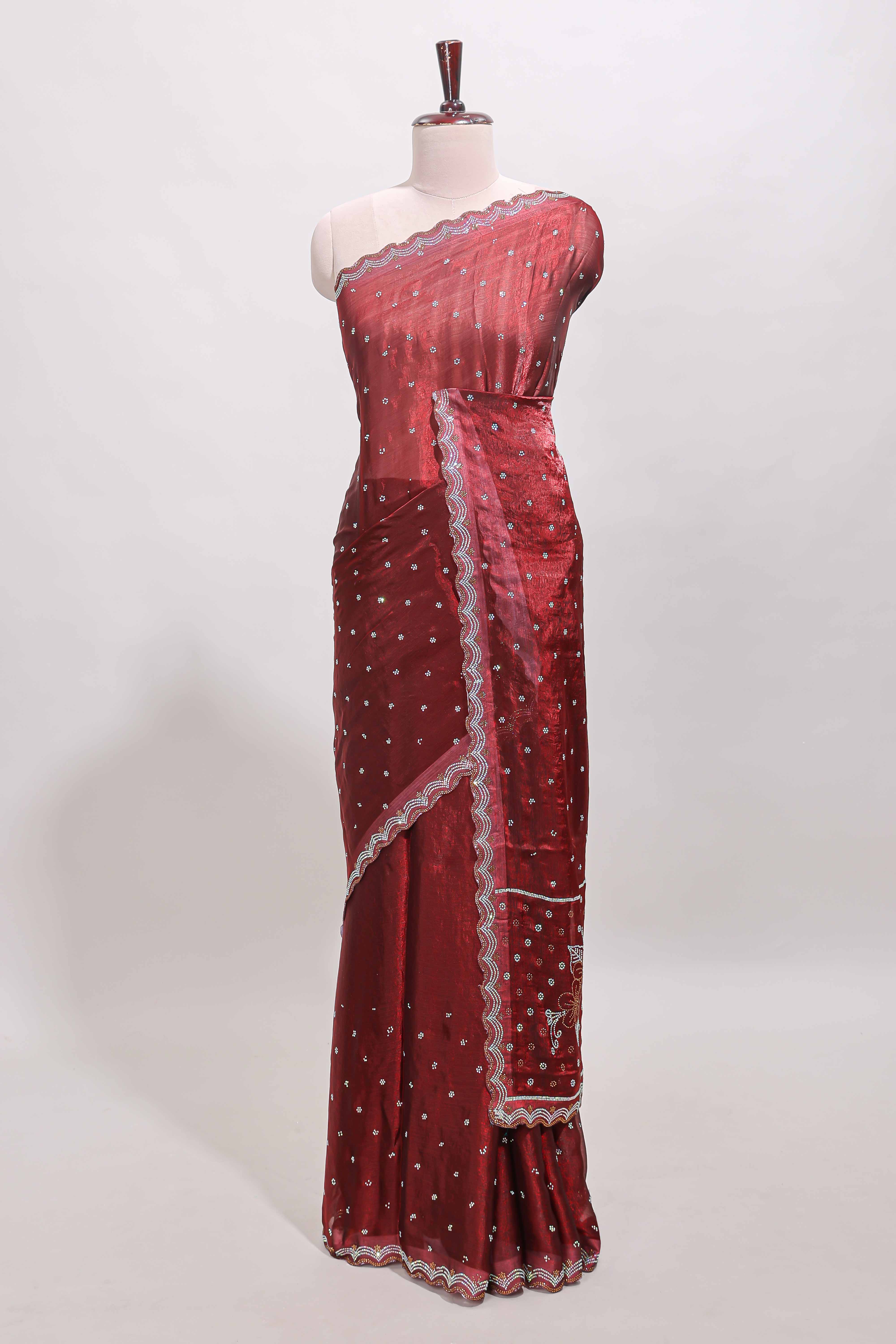 Maroon stone work floral motifs designer saree with self design scallop border and matching blouse