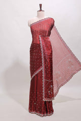 Maroon stone work floral motifs designer saree with self design scallop border and matching blouse